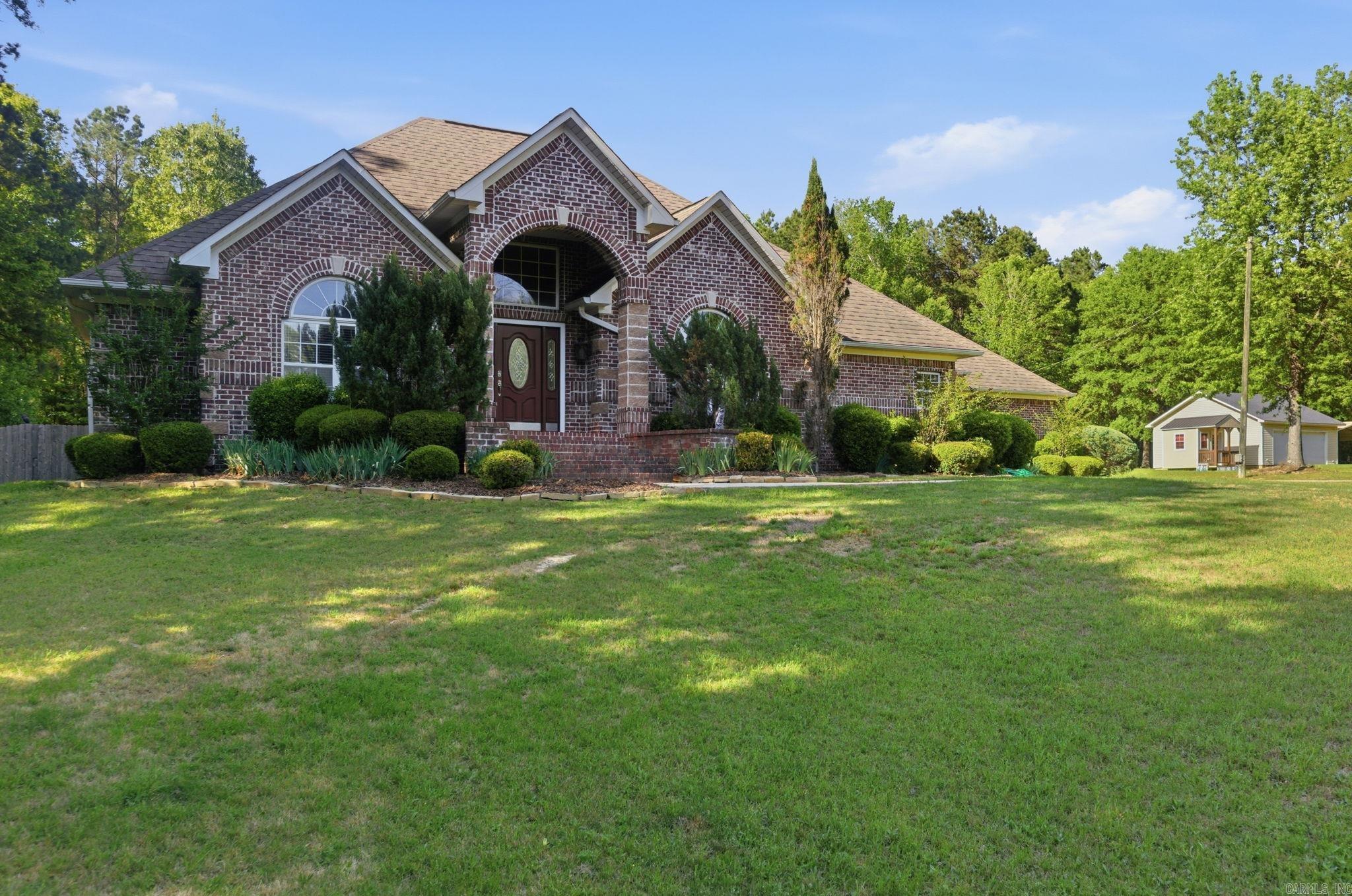 Welcome to 124 Wanda Gail Drive in the desirable Parker's Chapel area. This spacious home offers the perfect blend of comfort, function, and standout extras. Featuring 5 bedrooms and 3 bathrooms, there's room for family, guests, or a home office.   One of the biggest highlights is the huge detached shop with both front and rear bay doors, ideal for boats, vehicles, equipment, hobbies, or extra storage.  The property also includes a fully paid-off solar system with panels located on the shop, offering energy efficiency and long-term savings. Plus! a Kohler 20kw whole-home generator with automatic transfer switch for added peace of mind and reliable backup power!  If you've been searching for space, upgrades, and a property that offers more than the average home, this one is worth a look!