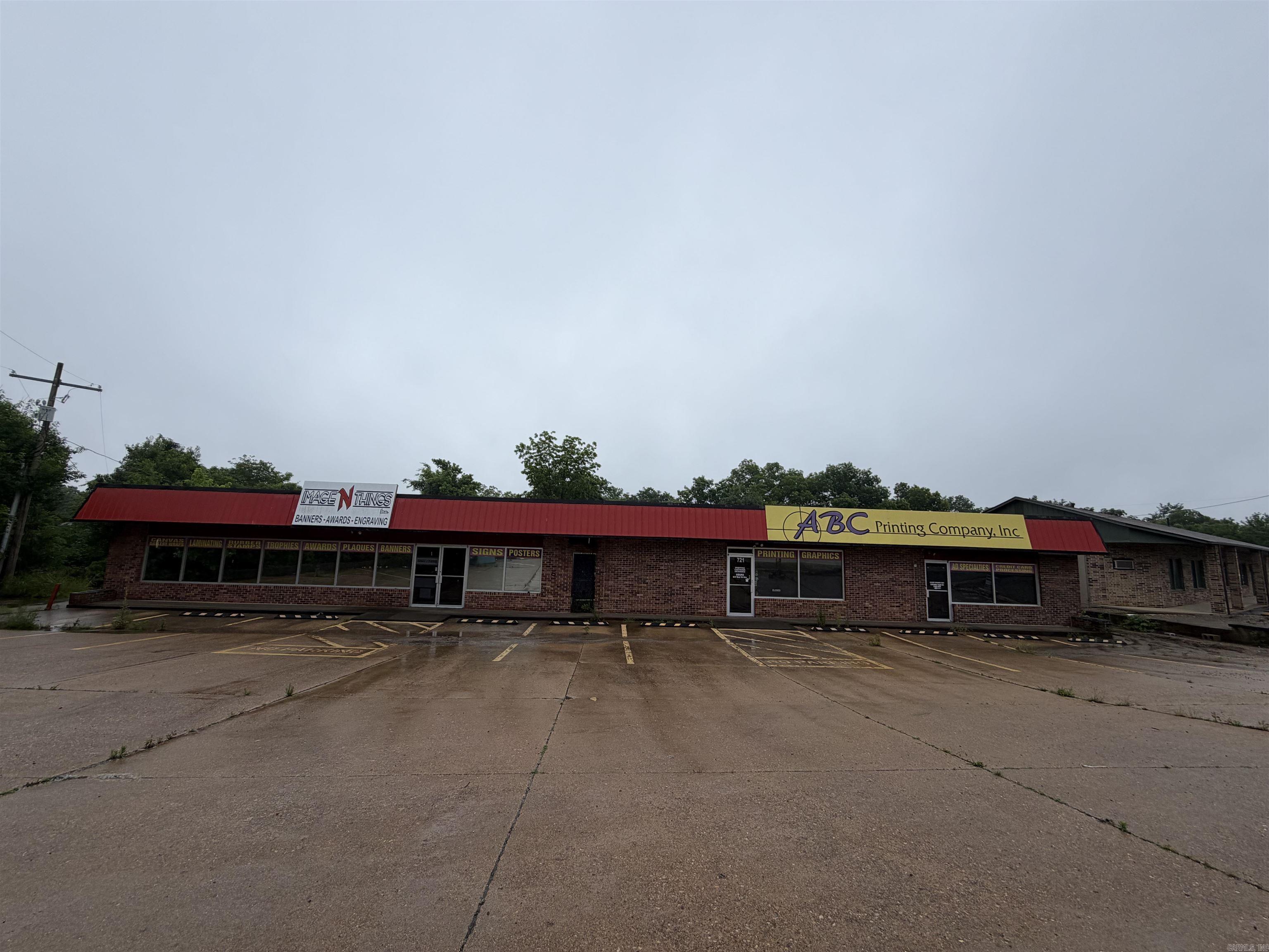 High-visibility commercial opportunity directly along Highway 5 North in Mountain Home! This flexible property features two side-by-side buildings offering an ideal mix of retail, office, and warehouse space. Each building is designed with dedicated office space alongside an open floor area, perfect for a variety of business layouts. Additional highlights include a small loading dock and convenient rear parking.