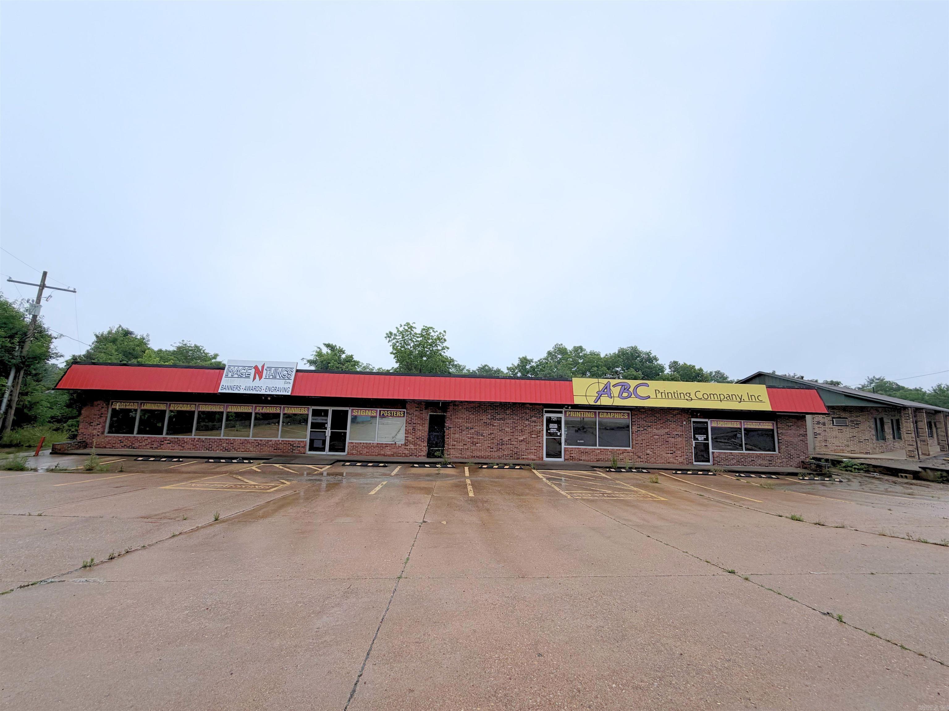 High-visibility commercial opportunity directly along Highway 5 North in Mountain Home! This flexible property features two side-by-side buildings offering an ideal mix of retail, office, and warehouse space. Each building is designed with dedicated office space alongside an open floor area, perfect for a variety of business layouts. Additional highlights include a small loading dock and convenient rear parking.