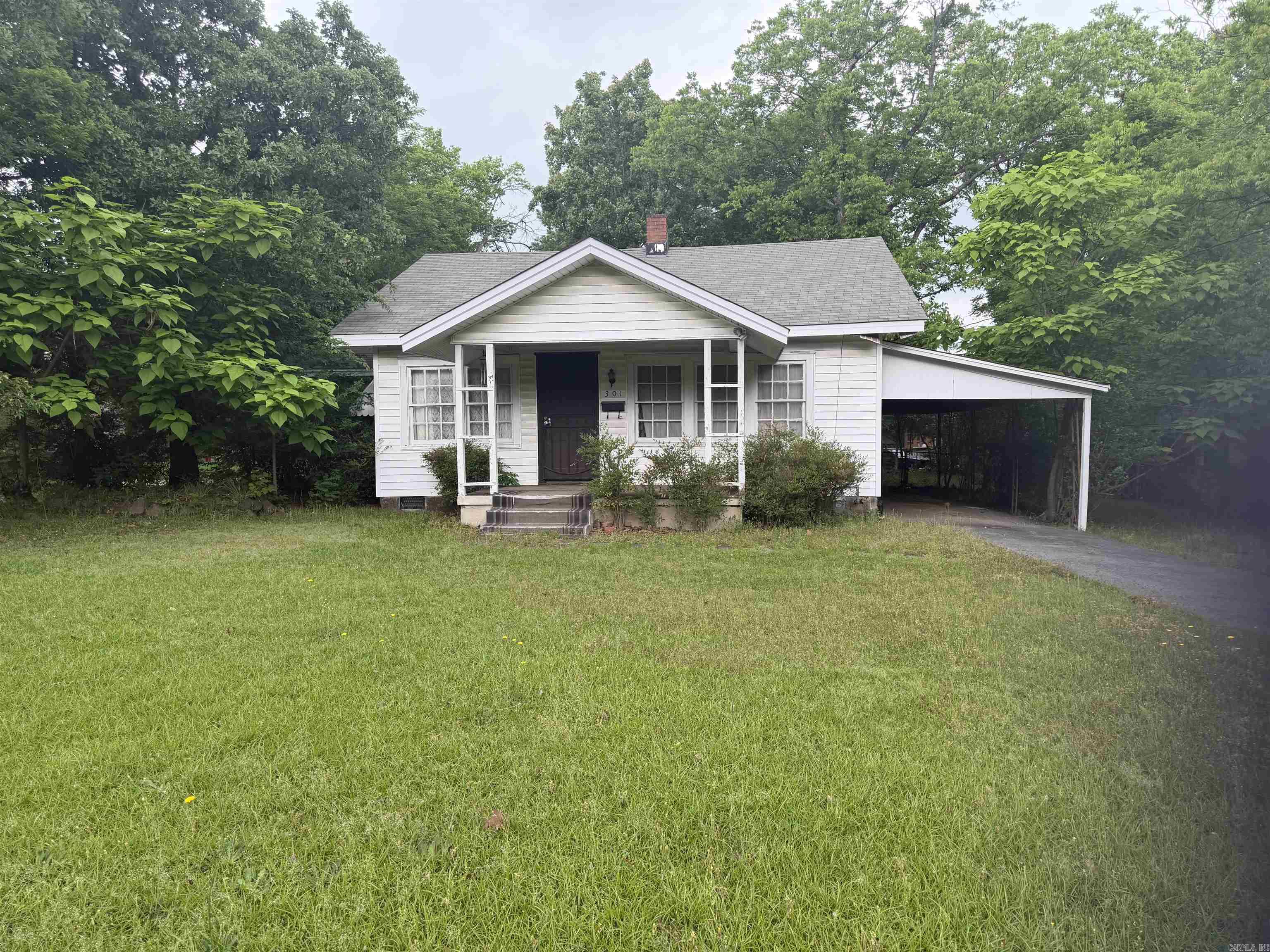Investor opportunity on a spacious corner lot!  This 1362 Square foot home, built in 1958, is full of character and ready for its next chapter.  Featuring original floors, vintage fixtures and classic built-ins.  Ideal for investors or first-time home buyers, this home is a true fixer-upper with solid bones and endless potential.  With a little vision and TLC, you can restore its original beauty or update it to suit modern tastes. The corner lot provides added space, curb appeal, and flexibility for future improvements. Don't miss your chance to transform this diamond in the rough into something special- whether you're looking to renovate, rent or create your dream home. This property is part of an estate, and all offers will be considered. Sold As IS