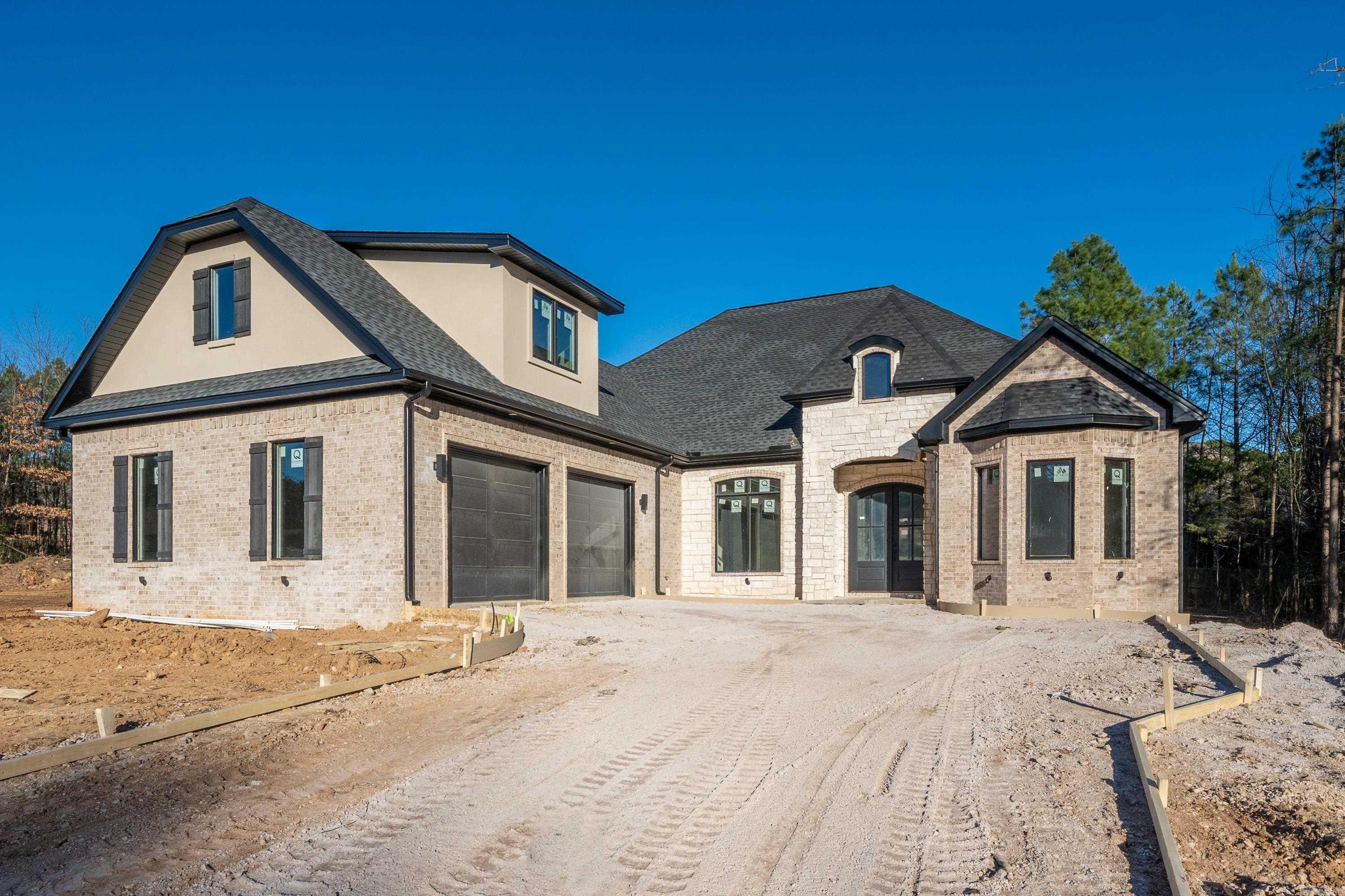 Located in gated Arlington Park Subdivision this brand new 4 Bedroom 3 Bath home is sure to please. It has 3295 sq. ft. of living space, and has an oversized 2 car garage. All of the bedrooms are located on the main floor and there is a large bonus room upstairs. The features in this home are endless, including a rock fireplace, vaulted ceilings, upgraded fixtures, built-ins, lots of storage, tankless water heater, foam insulation, and much more! You will love the back porch overlooking the large back yard. Perfect for entertaining! Located in Lakeside School District! Call today for a showing!