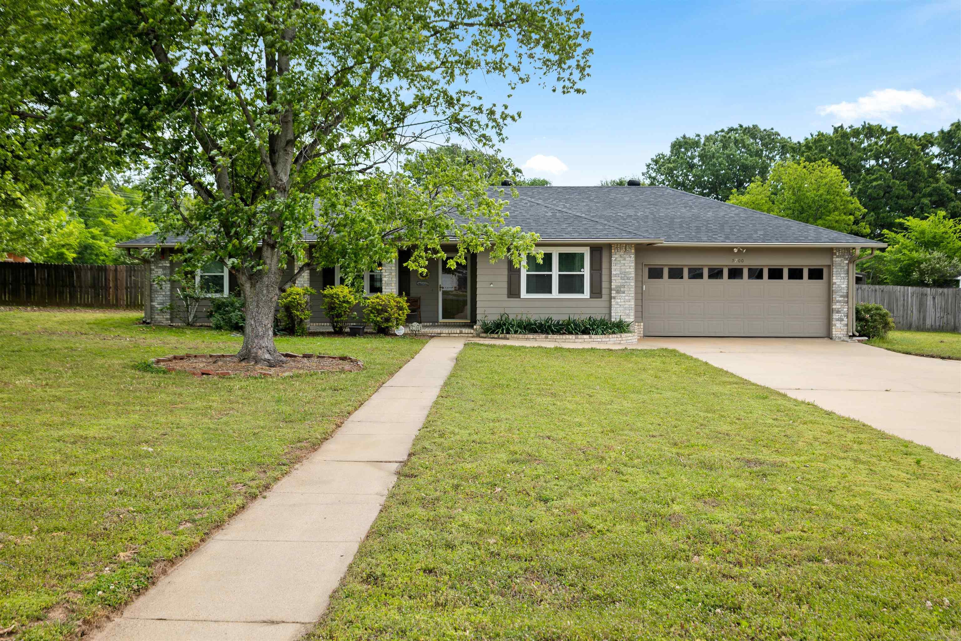 Welcome home to this beautifully maintained 3-bedroom, 2-bath home located in the highly desirable Valley View School District! Offering a split floor plan for added privacy, this home features a spacious living area with a cozy gas log fireplace and an abundance of natural light throughout. The oversized sunroom—currently used as a pool table room—provides the perfect flex space for entertaining, a second living area, game room, or home office. Situated on a large 1-acre lot, the fully privacy-fenced backyard offers plenty of room to relax, play, or entertain. Need extra storage or workspace? The insulated 18x24 shop with electricity is ready for hobbies, projects, or additional storage. Additional updates include a newer roof only 3 years old and windows replaced approximately 5 years ago. Complete with a 2-car garage and peaceful setting, this property offers the perfect combination of space, comfort, and functionality. Don’t miss your chance to enjoy country-style living with all the conveniences of town nearby!