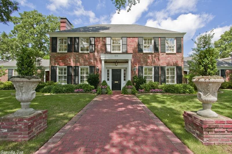 Landmark home tastefully updated.  Master can be up or down.  2 full baths on main level.  Cypress room could be 5th bedroom.  3 fireplaces.  Rear entry garage plus extra parking.  Gorgeous formal garden plus children's play yard. 9 foot ceilings with 2 story entry.  Gourmet kitchen, steam shower and much more. Block from CCLR golf course. 2 & 1/3 lots.  Quite an opportunity.