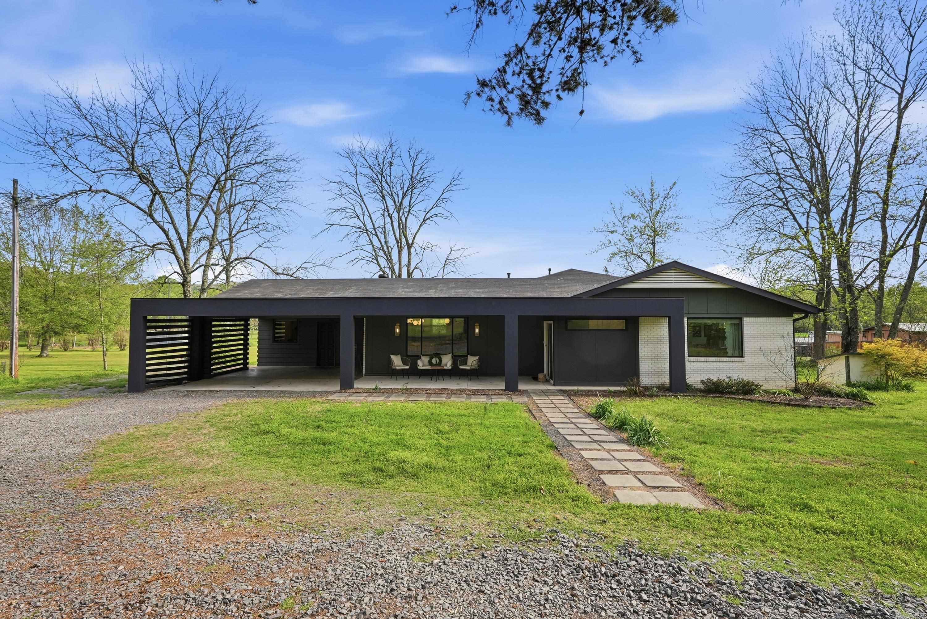 Welcome to 227 Friendship Road in Conway, Arkansas, where peaceful country living meets everyday convenience. Situated on 1 acre just minutes from Conway, I-40, and Beaverfork Lake, this property offers the space, privacy & lifestyle buyers are searching for in Central Arkansas. This charming 3 bedroom, 2.5 bathroom home offers 2,550 square feet with two spacious living areas and a dedicated office that could be used as a fourth bedroom, providing flexibility for working from home and entertaining. Large windows showcase beautiful views of the surrounding countryside and create a warm, inviting atmosphere. Outside you’ll enjoy a lifestyle that is increasingly hard to find. The property features an established garden, chicken coop, newly installed livestock panel fencing, freshly cleaned and ready-to-use barn, and a brand new 12x20 Stor-Mor side lofted storage building. Whether you dream of gardening, raising animals, or simply enjoying wide open spaces, this property is ready for it all. Wake up to breathtaking sunrises, farmland views, and abundant wildlife while still being only about 10 minutes from all that Conway has to offer. Schedule a tour and see why this home stands out.