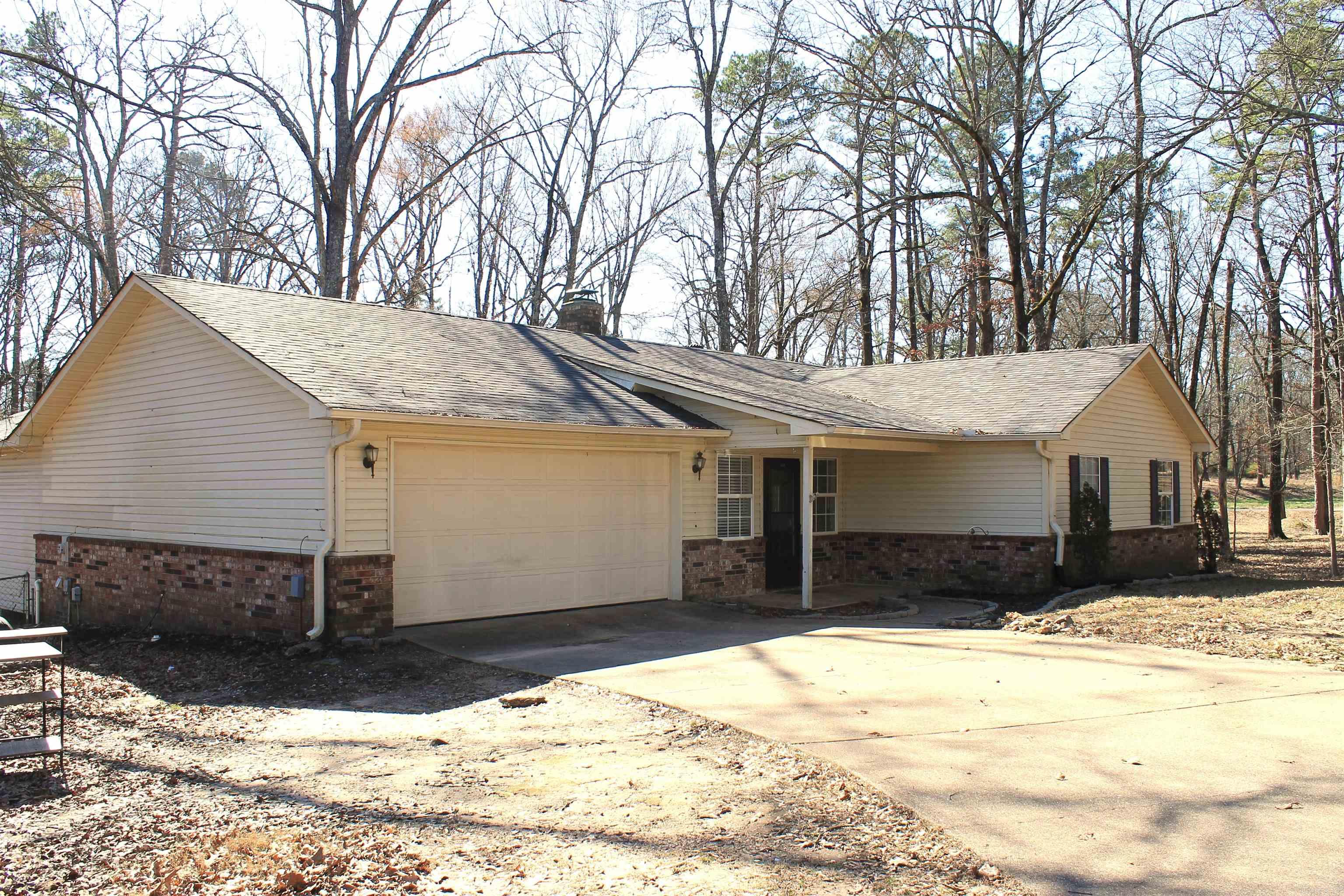 This wonderful home waiting to be yours is located in a quiet cul-de-sac giving you the comfort and peace of country living while being close to the conveniences of town! Surrounded by nature with mature trees and a running creek. This home has plenty of space to spread out with over half an acre. 3 Spacious bedrooms with an enormous master bedroom with door leading outside. Large master bath with jetted tub for relaxing and 2 walk-in closets. Located in Lake Hamilton School dist. If you are looking for space, great neighborhood, natural surroundings with convenience in beautiful Hot Springs then look no further, this is the place for you! Get it quick, come take a look today!