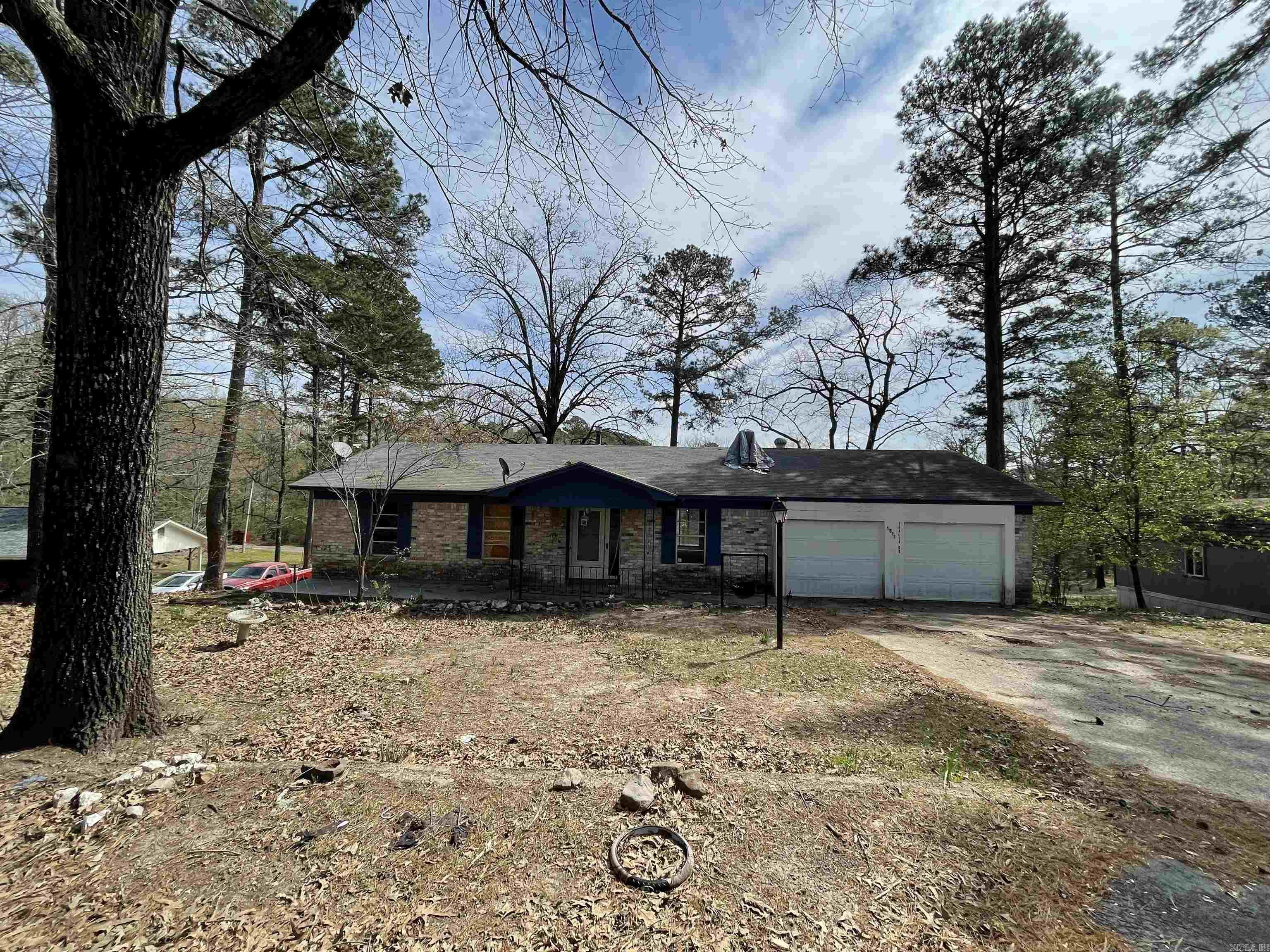 Great opportunity! This brick home is full of potential and ready for its next owner to bring it back to life. Featuring 3 bedrooms plus a bonus room that could serve as a 4th bedroom, this property offers flexible living space to fit your needs. The home includes 3 full bathrooms, with one conveniently located in the fully functional basement. Downstairs, you’ll also find additional rooms with closets, an exterior entrance, and plenty of storage—ideal for guests, a workshop, or extra living space. Enjoy a patio just off the dining area, a 2-car garage, and an additional storage building—plenty of room for all your needs. Located in a great neighborhood near the upcoming bike trails, this property offers both convenience and long-term value. This property does need some work, but with the right vision, it could be transformed into a fantastic home or investment. Agents see remarks.
