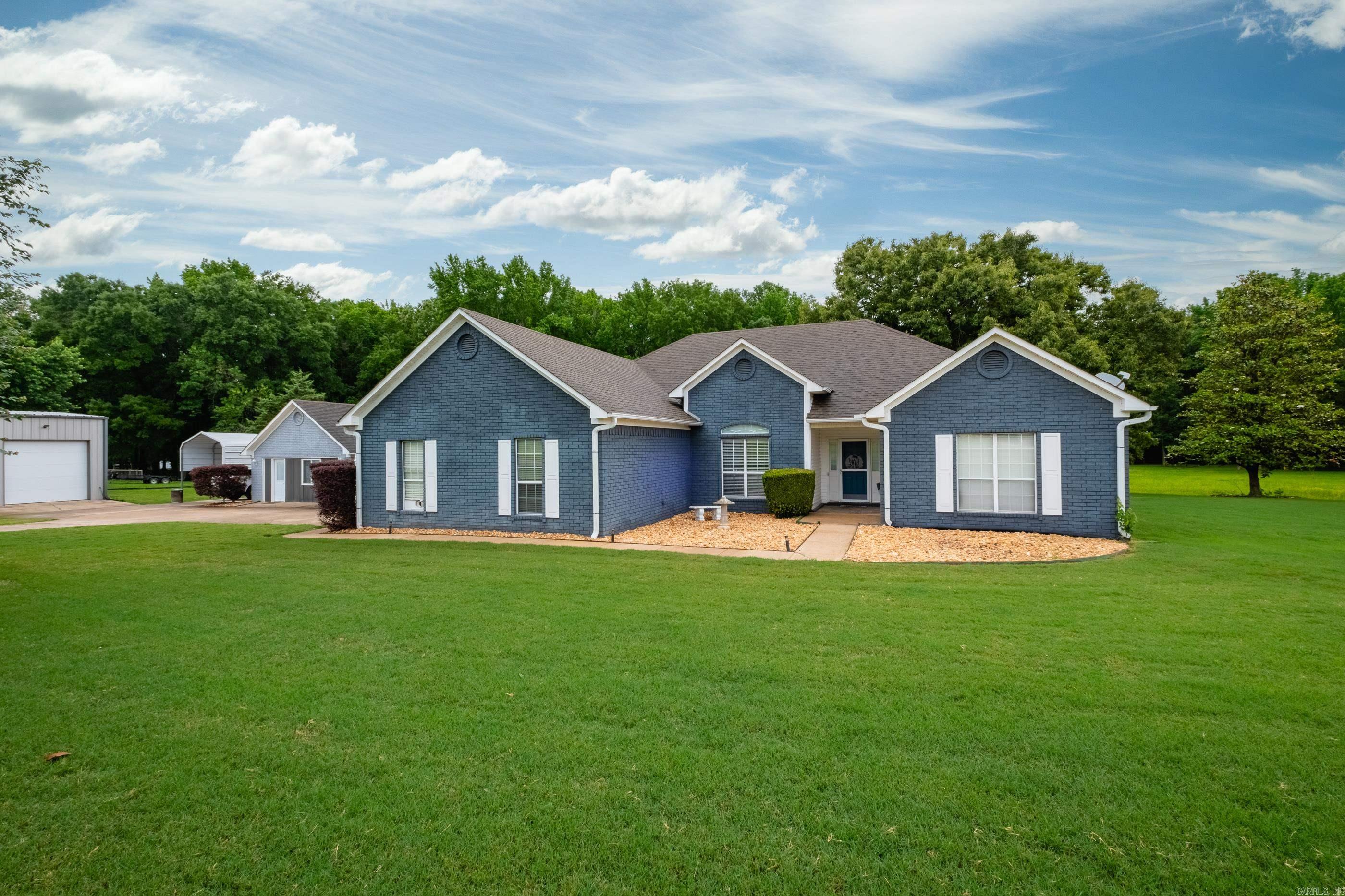 Paradise awaits on this beautiful 3.18-acre property in Conway featuring a backyard retreat, guest home, pool, and impressive 30x40 shop! This 4 bedroom, 2 bath home with 2-car garage offers space, flexibility, and luxury living with room to entertain and enjoy. Step outside to your own private oasis with a spacious deck overlooking the pool and outdoor living area. The separate guest home includes a kitchenette, full bath with walk-in shower, covered patio, and direct access to the pool area — perfect for guests, extended family, in-law quarters or private workspace. The 30x40 shop features durable epoxy flooring, 2 large 12' overhead doors, and ample room for hobbies, storage, vehicles, or equipment. Additional features include RV storage area, extra parking, and wide-open green space with endless possibilities. Whether you are looking for peaceful country living, entertaining space, or room for all your toys and projects, this property offers a rare combination of comfort, function, and lifestyle all in one amazing setting. New Roof 2026. See Documents See Agent Remarks