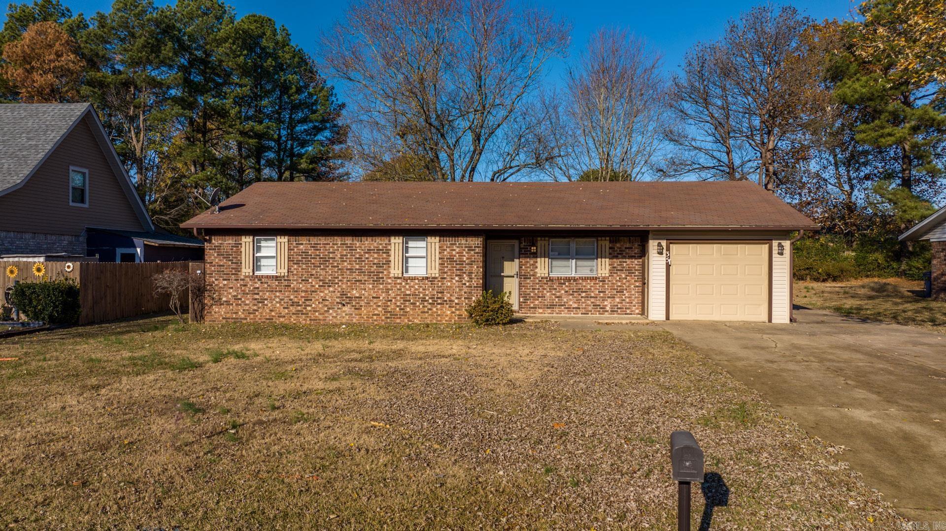 Calling all investors or first time homebuyers! This one is for you! This 3 bedroom 1 bath home is right in the heart of Cabot! It has been recently updated to boast hardwood look tile throughout, tiled backsplash, fresh paint, and more! Back yard is fenced in with a large covered porch that is great for entertaining! The one car garage as well as extra parking pad around the side will ensure plenty of room for all of your vehicles and toys! All of this for less that $150k! Call your agent on this one before it is gone!