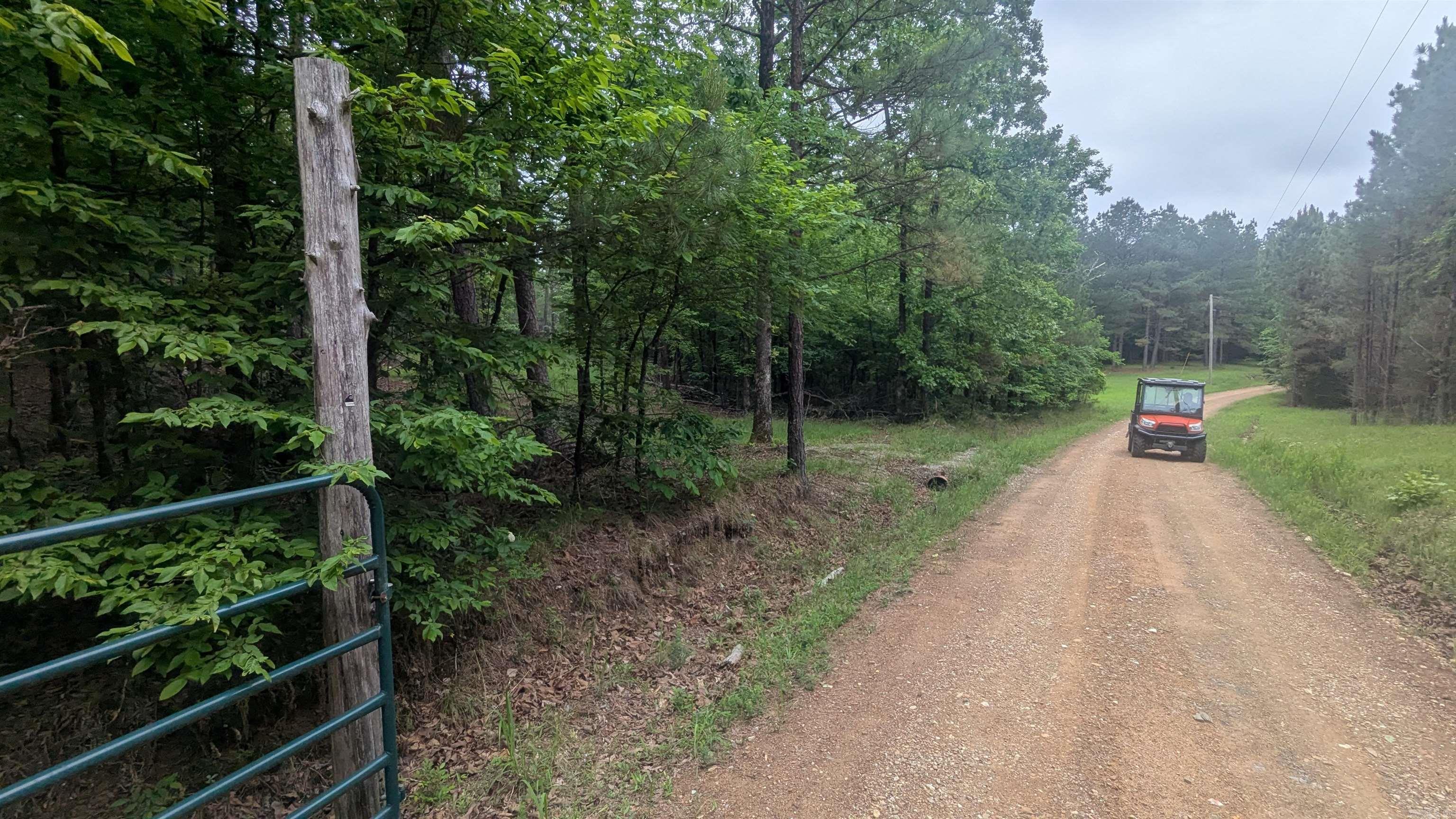 Escape to your own private 40-acre hunting and recreational retreat near the Saline River. Surrounded by peaceful forest with abundant deer and wildlife, this secluded property is ideal for hunting, trail riding, hiking, or Side-by-Side adventures. Existing trails are already in place, making it easy to enjoy the land immediately.  The property offers excellent buildable potential for a cabin, barndominium, or weekend getaway. Electricity is available near the road, and a well would be needed for water. Pool Rd is a public road maintained by local landowners, and gated access with owner-issued codes helps provide privacy and protection from trespassers and poachers.  Located just 20 minutes from Benton and Hot Springs, this property combines seclusion with convenience. With timber value and strong recreational appeal, it’s also a great long-term investment opportunity. Saline County Parcel #001-11529-006    Please allow 24 hour notice to view property. Appointment required. List Agent and/or Seller will accompany potential buyers due to remoteness of area. Gate Code would be provided prior to appointment. LandGlide App, or Hunting App recommended. Bring your Side x Side and c'mon.