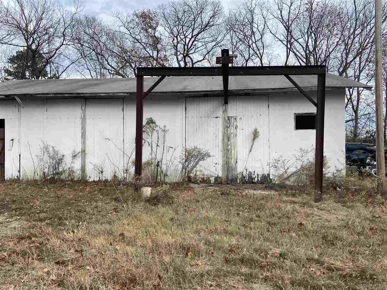AWESOME INVESTMENT PROPERTY!!!  This property includes several lots with utilities already on site.  There is a large shop that could serve multiple purposes to fit your needs.  Total size of lots is approximately 1.75 acres and is conveniently located in town.