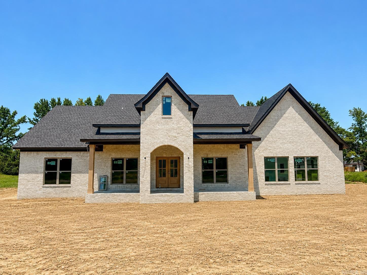 Welcome to this stunning new construction home in Ward, offering the perfect blend of space, style, and modern comfort. Situated on a beautiful one-acre lot, this 4-bedroom, 2.5-bath home features soaring ceilings that create an open, airy feel from the moment you walk in.  The thoughtfully designed floor plan provides both functionality and flow, with spacious living areas ideal for everyday living and entertaining. The kitchen is the heart of the home, offering ample storage and workspace, while the generous bedrooms provide comfort for the whole family. The primary suite offers a private retreat with plenty of room to unwind.  Enjoy the peace and privacy of country-style living while still being conveniently located near town. With quality craftsmanship, modern finishes, and room to grow, this home is a must-see. Estimated completion is end of July.