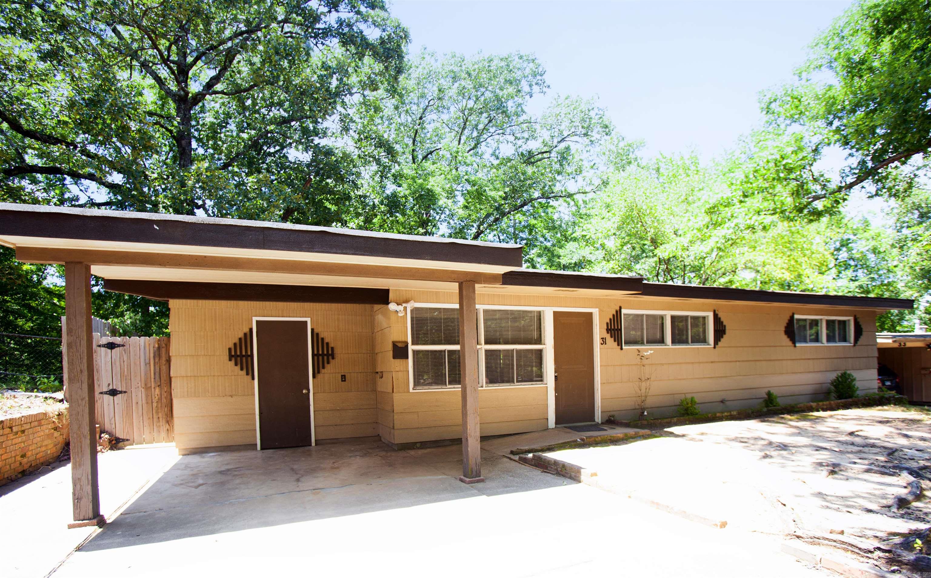 Recently renovated. There is beautiful granite tile in one of the bathrooms. The kitchen has granite countertops and comes with a refridgerator! The lease for this property is for 2 years with a 3% increase after the first year. Income has to be three times the amount of rent. NO SECTION 8.  **All properties may not be move-in ready***
