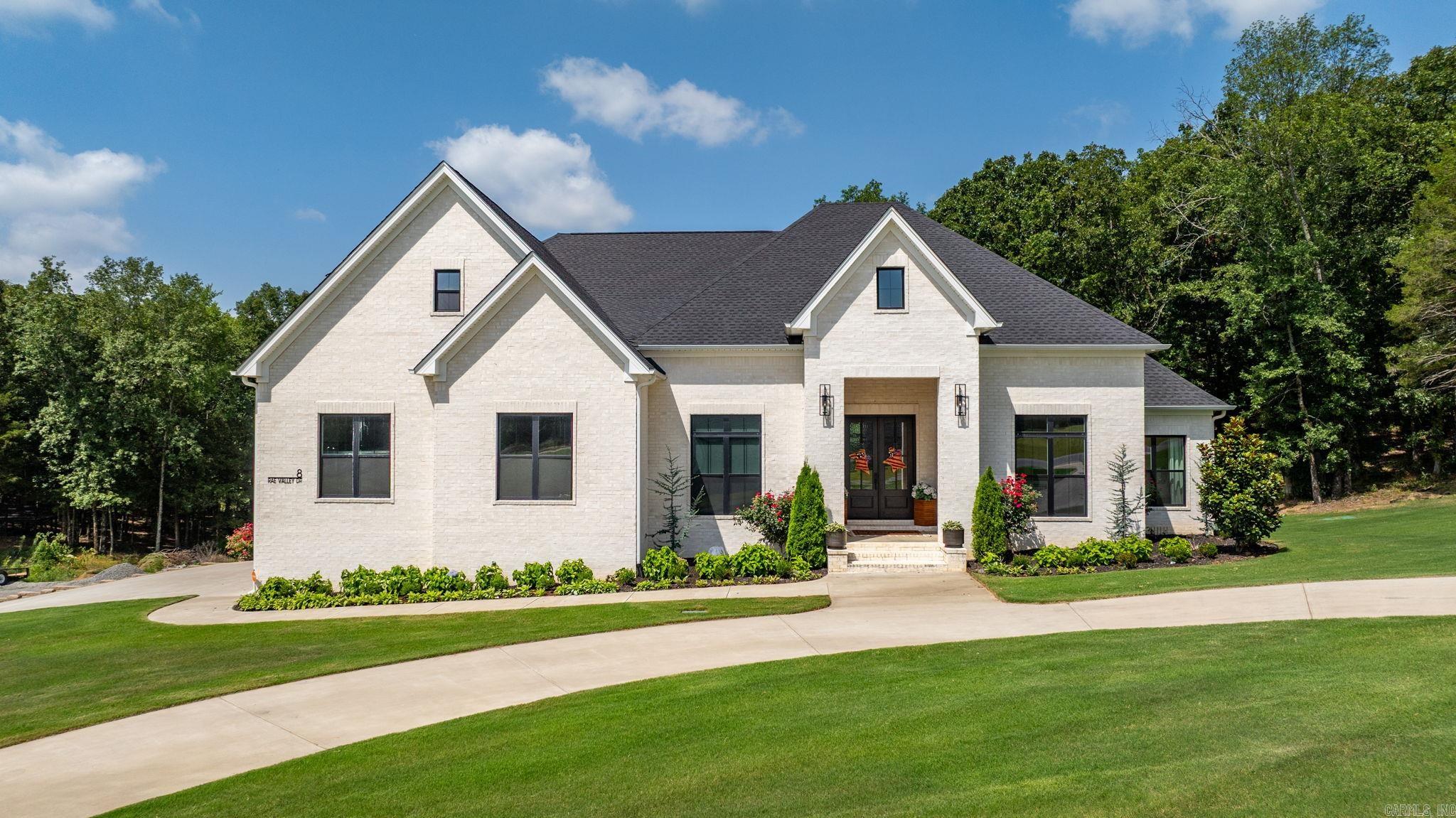 Beautiful custom-built home in Greenbrier offering approximately 3,300 square feet on a 0.94-acre lot! This home features 4 bedrooms, a dedicated office that could easily be used as a 5th bedroom, and 4.5 bathrooms. Built in 2024, this traditional brick home offers quality craftsmanship and thoughtful finishes throughout.  The spacious kitchen features custom floor-to-ceiling white oak cabinetry, stunning quartzite waterfall countertops, a built-in drawer microwave, a cooktop, wall oven, dishwasher, disposal, vent hood and a large pantry complete with an additional prep sink. Additional features include luxury vinyl plank flooring, a beautiful tile shower, blown cellulose insulation, tankless water heater, energy-efficient HVAC system, and a cozy fireplace.  Outside you’ll find a 3-car garage, concrete driveway, covered front and back porches, and plenty of room to enjoy the nearly one-acre lot. Home is connected to Greenbrier public water and sewer with Summit Natural Gas service.  Don’t miss your opportunity to own this beautiful, nearly new home in one of Greenbrier’s desirable neighborhoods. Call today to schedule your private showing!