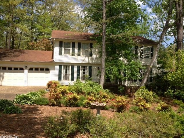 Beautifully landscaped home in coveted Roberts school district.  Perfect for a family with large living room, dining room, three spacious bedrooms, fourth bedroom would make a great office space, large custom master closet, 2.5 bathrooms, gas fireplace in den.  Remodeled kitchen with black appliances. Oversized garage, terraced deck, lots of storage inside!