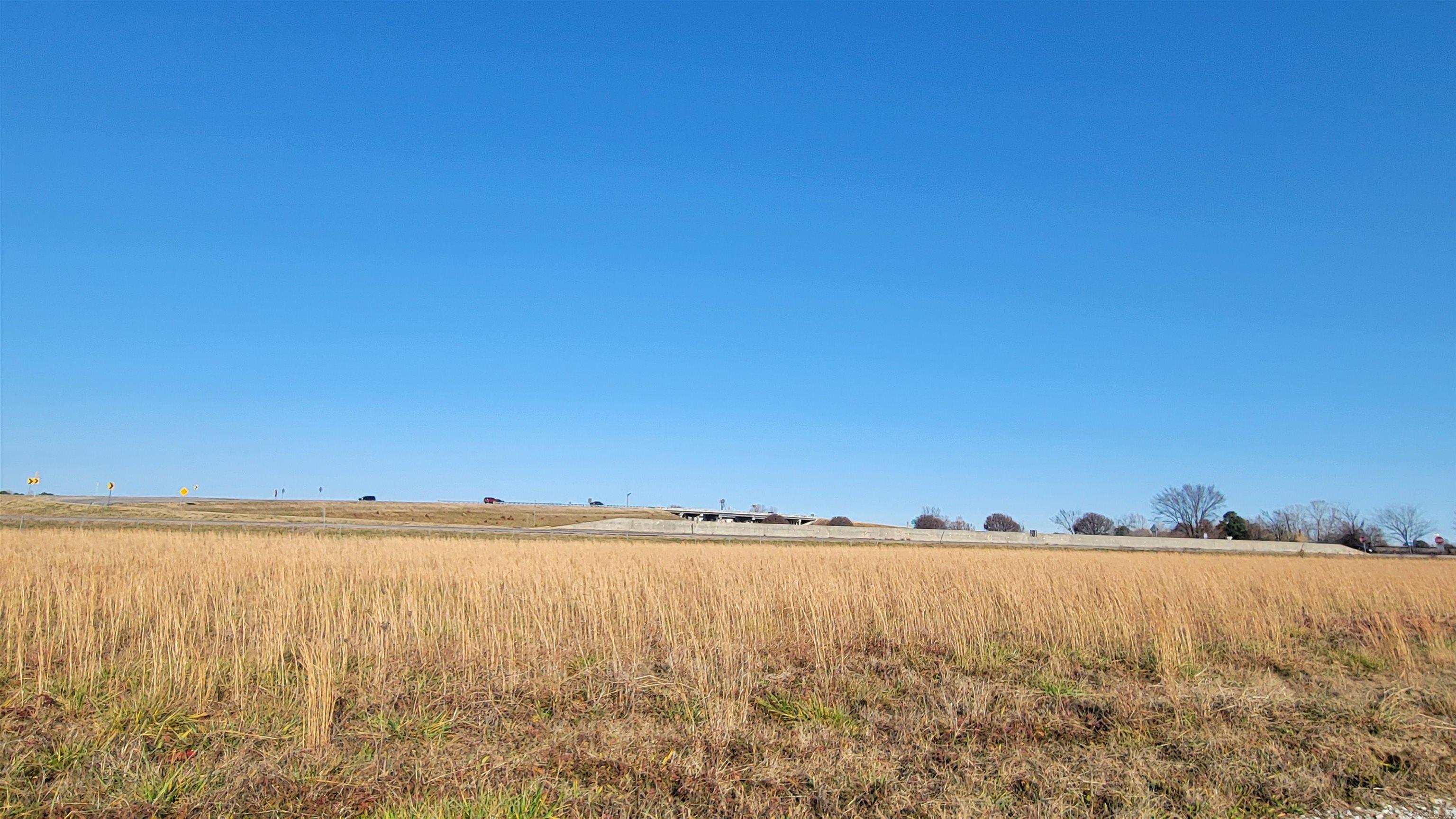 Acreage located off I-555. Property is zoned R-3 with conditional use approved for townhome, apartment, or condo. City utilities on property. Additional acreage available.  City will rezone for commercial usage.