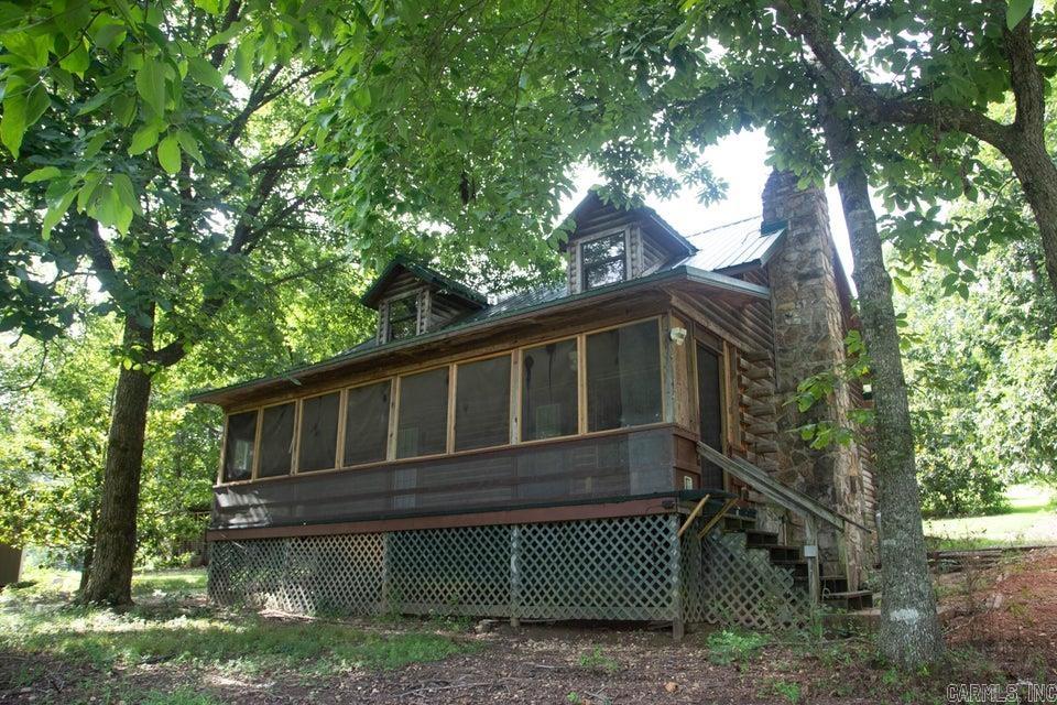 Charming Log Home Retreat on 5± Acres Escape to your own slice of country paradise with this inviting 3-bedroom, 2-bathroom log home set on 5± private acres. Rustic charm meets everyday comfort in this well-maintained property, ideal for those seeking space, self-sufficiency, and a true connection to nature. The detached garage is a standout feature, complete with a cozy wood stove and a utility sink with hot & cold water -- perfect for a workshop, hobby space, or extra storage with year-round usability. Outdoor living shines here: enjoy fresh eggs from your own chicken coop, harvest fruit from established fruit trees and grapevines, and unwind by the peaceful pond. An additional storage shed offers even more room for equipment, tools, or projects. Whether you're dreaming of a hobby farm, a homestead lifestyle, or simply more room to roam, this log home offers the perfect blend of character and functionality. Don't miss this rare opportunity to own a private retreat with endless charm. Schedule your showing today!