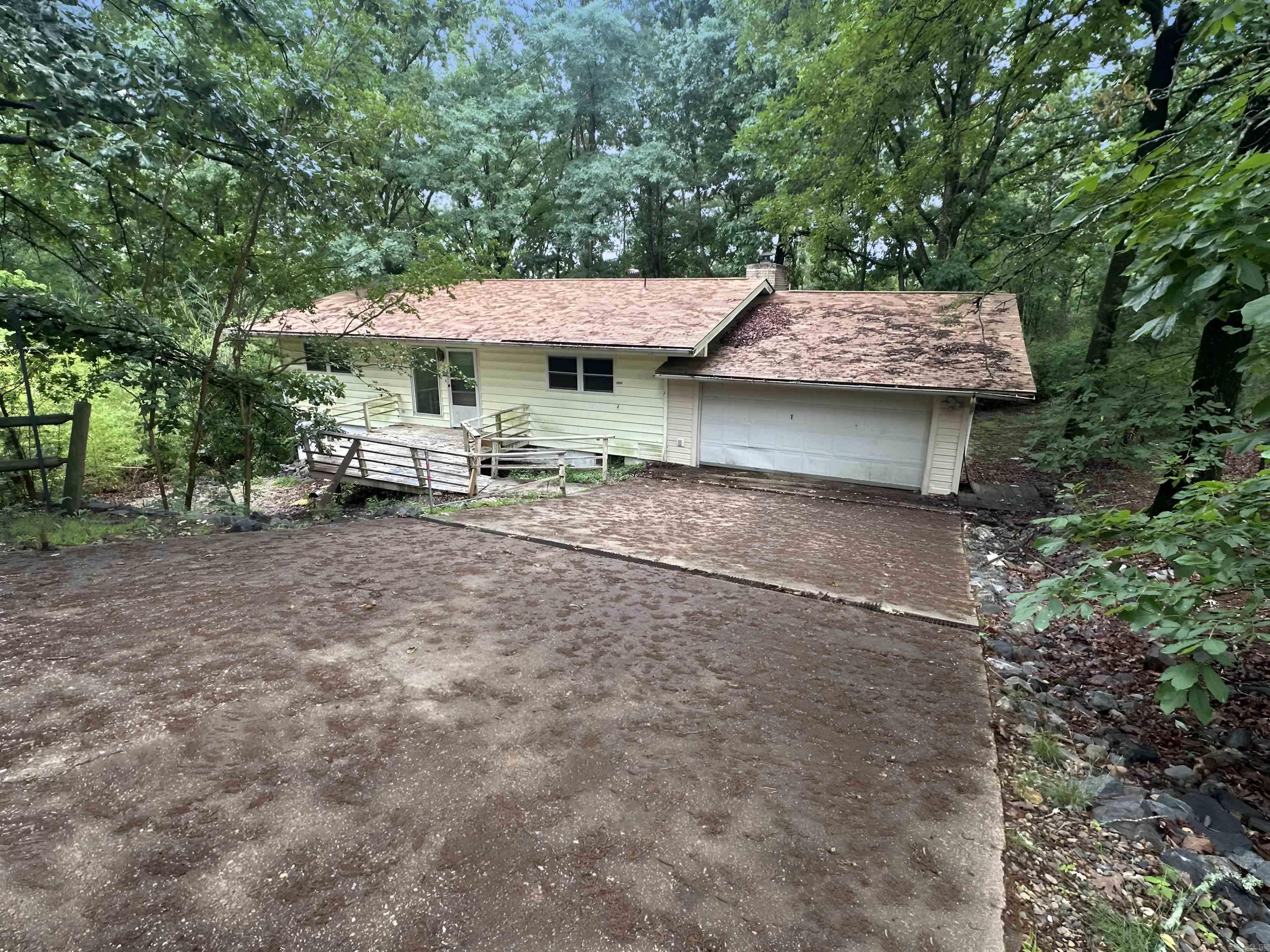Don't miss out on this cute and spacious 2 bedroom, 2 bath home featuring an open floor plan, living room with fireplace, dining, kitchen, 2BR & 2 baths on main entry level, and lower, below grade level features a large bonus room, 1 bedroom, 1 bath, laundry and basement workshop area.  Decks are on front and back of home, backing up to serene green space.  Agents, please go to Confidential Remarks section in MLS and READ for information on showing, how to submit offers, and other info.