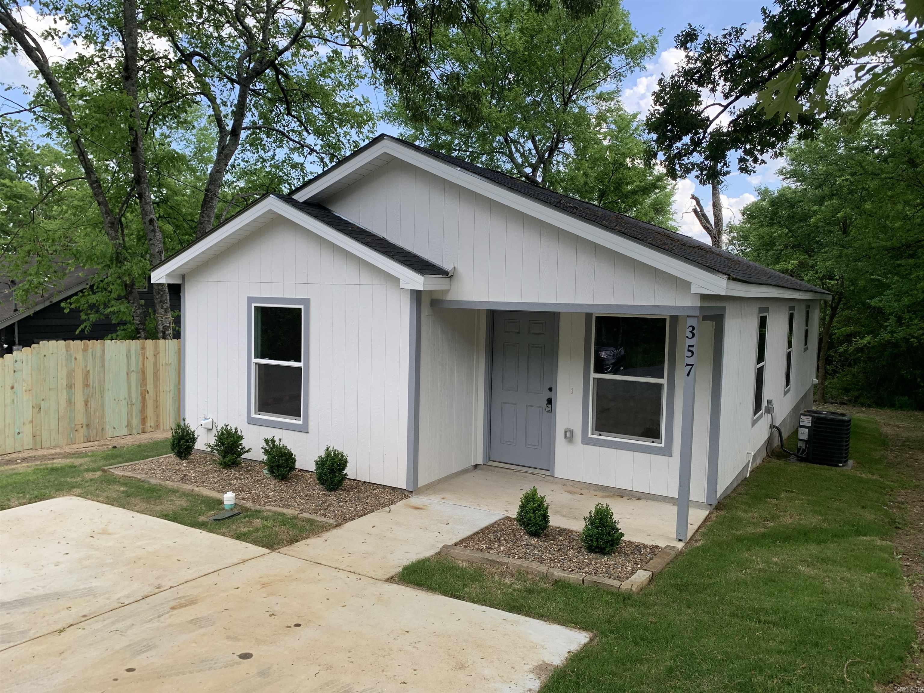 Discover this beautiful new construction currently completed in Hot Springs, Arkansas, offering an ideal combination of style, efficiency, and affordability. Located just minutes from restaurants, shopping, and the historic downtown area, this modern patio home features a thoughtful design that embodies contemporary living. Seller Concessions**** $5,000 in Closing Costs Assistance**** With its attractive Smart Siding and stylish modern colors, this home will provide impressive curb appeal. Inside, you'll find sleek flooring, exquisite granite countertops, and an open layout that promotes comfortable living. Perfectly suited for those who value both aesthetics and practicality, this 3-bedroom, 2-bath home invites you to enjoy a lifestyle of comfort.  Seller Concessions**** $5,000 in Closing Costs Assistance****