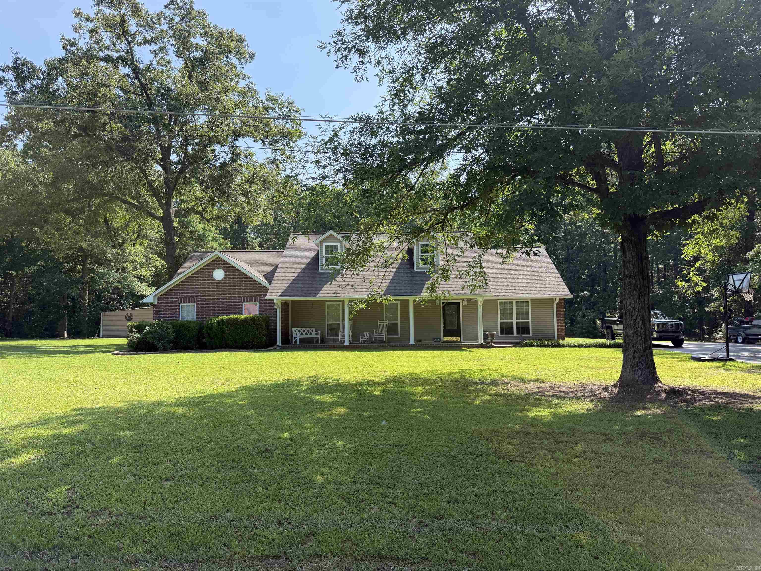 Nestled on a beautiful 1.63-acre lot, this well-maintained 4-bedroom, 2-bath home offers the perfect blend of comfort, space, and functionality. Inside, you'll find a spacious living room ideal for relaxing or entertaining, a separate dining room for family gatherings, and an inviting eat-in kitchen complete with a wall oven and plenty of room for meal preparation. The generous primary suite serves as a private retreat, featuring a garden tub, separate shower, and double vanity. Spacious guest bedrooms provide comfort and flexibility for family, guests, or a home office.  Step outside to enjoy the patio overlooking the picturesque acreage, offering plenty of room to unwind and enjoy the peaceful surroundings. A storage shed/workshop provides additional space for hobbies, projects, or extra storage. With its desirable layout, beautiful setting, and meticulous care, this property is ready for you to call it home.