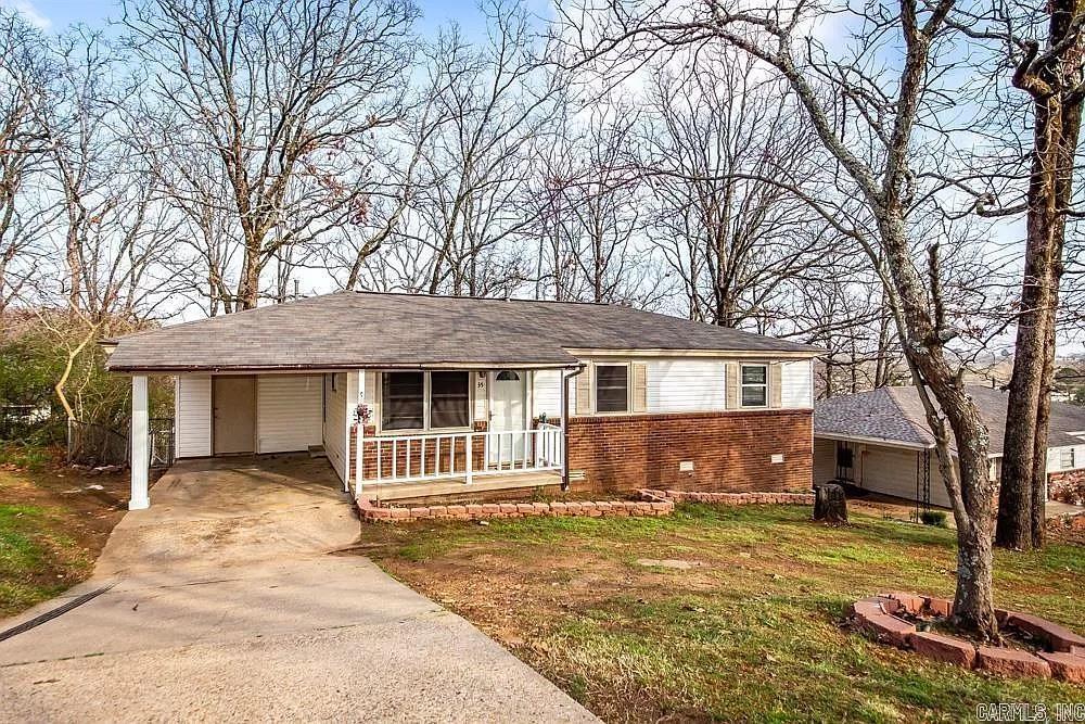 Welcome to 35 Oakview Drive in the Glen Oaks subdivision of North Little Rock — a recently updated one-story home offering comfort and convenience in a central location.  Great investment property!  Built in 1968, this 3-bedroom, 1-bath home features approximately 912 square feet of living space, all on one level. Inside, you’ll find original hardwood floors paired with a modern color palette that creates a fresh, inviting feel. The layout includes a great room and an eat-in kitchen that flows easily for everyday living.  Step outside to enjoy a covered patio and deck overlooking the backyard, offering space to relax, entertain, or unwind at the end of the day. The property also includes a carport, driveway parking, and additional storage options. Situated on approximately 0.16 acres, the manageable lot provides room to enjoy without excessive upkeep.  With convenient access to surrounding areas and everyday amenities, this home offers updated style with practical features. Schedule your showing and see what makes this one worth a closer look.