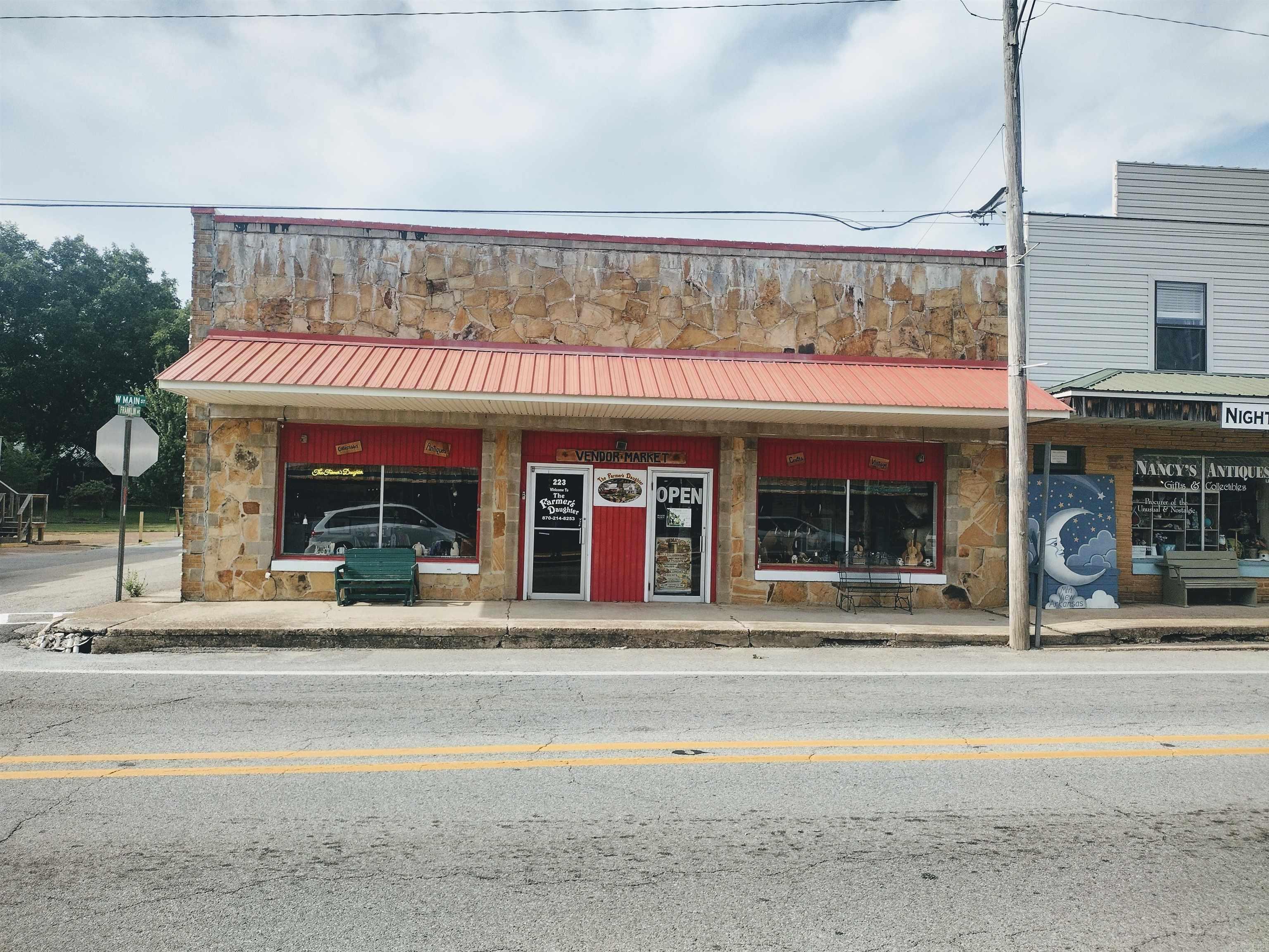Looking to invest or start your own business? Don't miss this outstanding opportunity to own a 4,224 sq. ft. commercial building just steps from the courthouse square!  The front three-quarters of the building is currently operating as a successful vendor market with approximately 50 rented vendor spaces, providing excellent income potential. The back portion is leased to the Back Door Deli and comes fully equipped with restaurant equipment, making it ready for continued operation.  Major updates include a brand-new A/C unit, a 2-year-old heating unit, and a new hot water heater. With plenty of parking, a prime location, and multiple income opportunities, this property is ideal for investors or entrepreneurs looking to expand or start a thriving business.  Schedule your showing today and see the possibilities this unique commercial property has to offer!