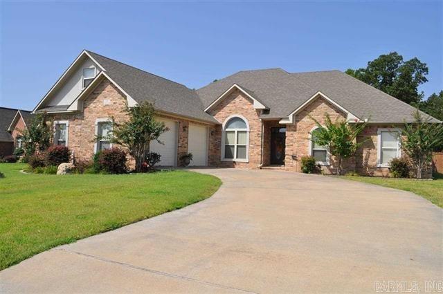 4 bedrooms plus an upstairs bonus room!  Pretty, well maintained home offers formal dining room, living room with fireplace & wood flooring.  Kitchen offers lots of cabinets, granite countertops, pantry, GAS stove.  Master suite has fireplace/sitting area, master bath has his/her closets & double sinks.  Three other bedrooms on opposite side.  Oversized garage.  Out back you will find a covered patio, deck, fenced back yard & fairly new hot tub that stays!  One year social membership to Greystone included!!