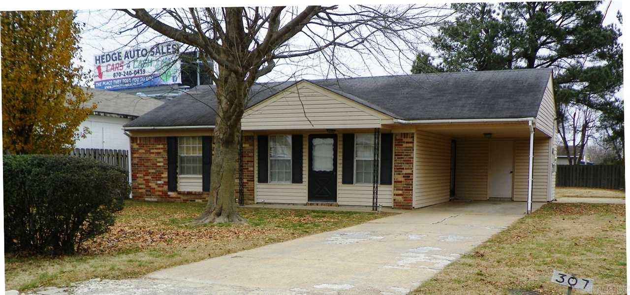 Great home that could very easily be converted back to a 3 bedroom. Currently 2br 1ba all electric home on a slab with very nice sized back yard. Tons of closets in this home. Kitchen/dining combo with pantry and fridge remains. Outside storage area in the carport, partially fenced, shop/storage building has electric and lean to.  Maintenance free siding and gutters. Call today!