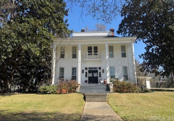 Located in the beautiful and historic North Main Street area, this stunning home blends timeless character with thoughtful modern updates. Offering 4 bedrooms upstairs and the possibility of a 5th downstairs, 2 full bathrooms with claw foot tubs and a half bath, and 3,784 sq ft of living space, it provides room for a large household and plenty of areas for entertaining. The spacious kitchen was remodeled in 2009 and features tile flooring, a convenient work island with seating, and a 5-burner gas stove. A majestic staircase leads to the second floor, where you’ll find four bedrooms including the primary suite, also updated in 2009. Major improvements include a new roof in 2018 and a downstairs HVAC replacement in 2017 (upstairs unit age unknown). As summer approaches, enjoy cooling off in the above-ground pool with surrounding deck. This home is full of charm, space, and modern comfort. A must-see!