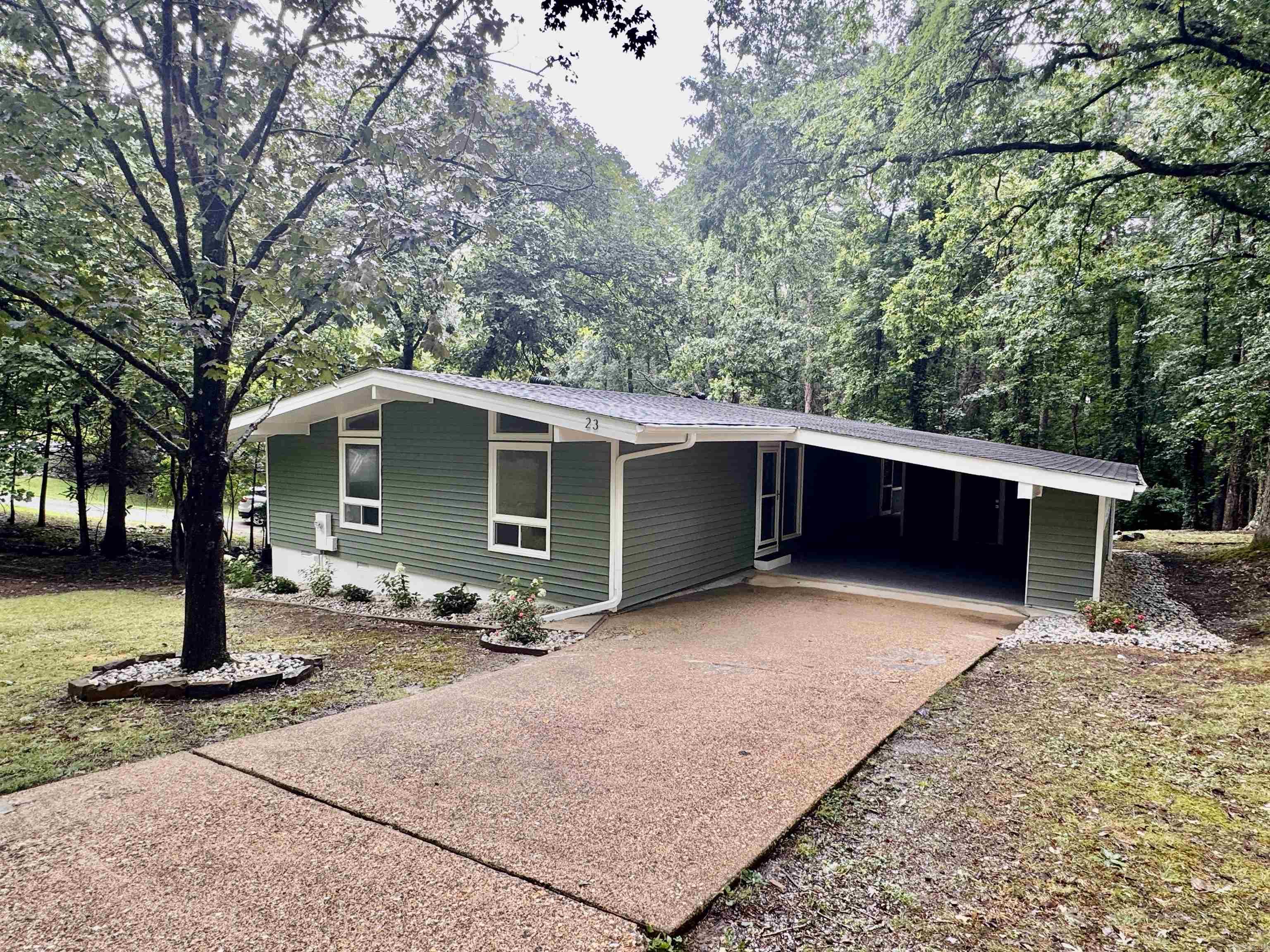 Not just remodeled, this home is completely renovated, turnkey new, and move-in ready! Nothing left to do but enjoy life. New roof, new siding, and landscaping. On the interior, you'll find new sheetrock, new LVP flooring throughout, quartz countertops, new (never-used) appliances, a new tile walk-in shower, new lighting, and so much more. Below you will have a large storage area in your walk-in height crawl space with a concrete floor. This would be a great area to set up a crafts shop or anything you want to do with it.