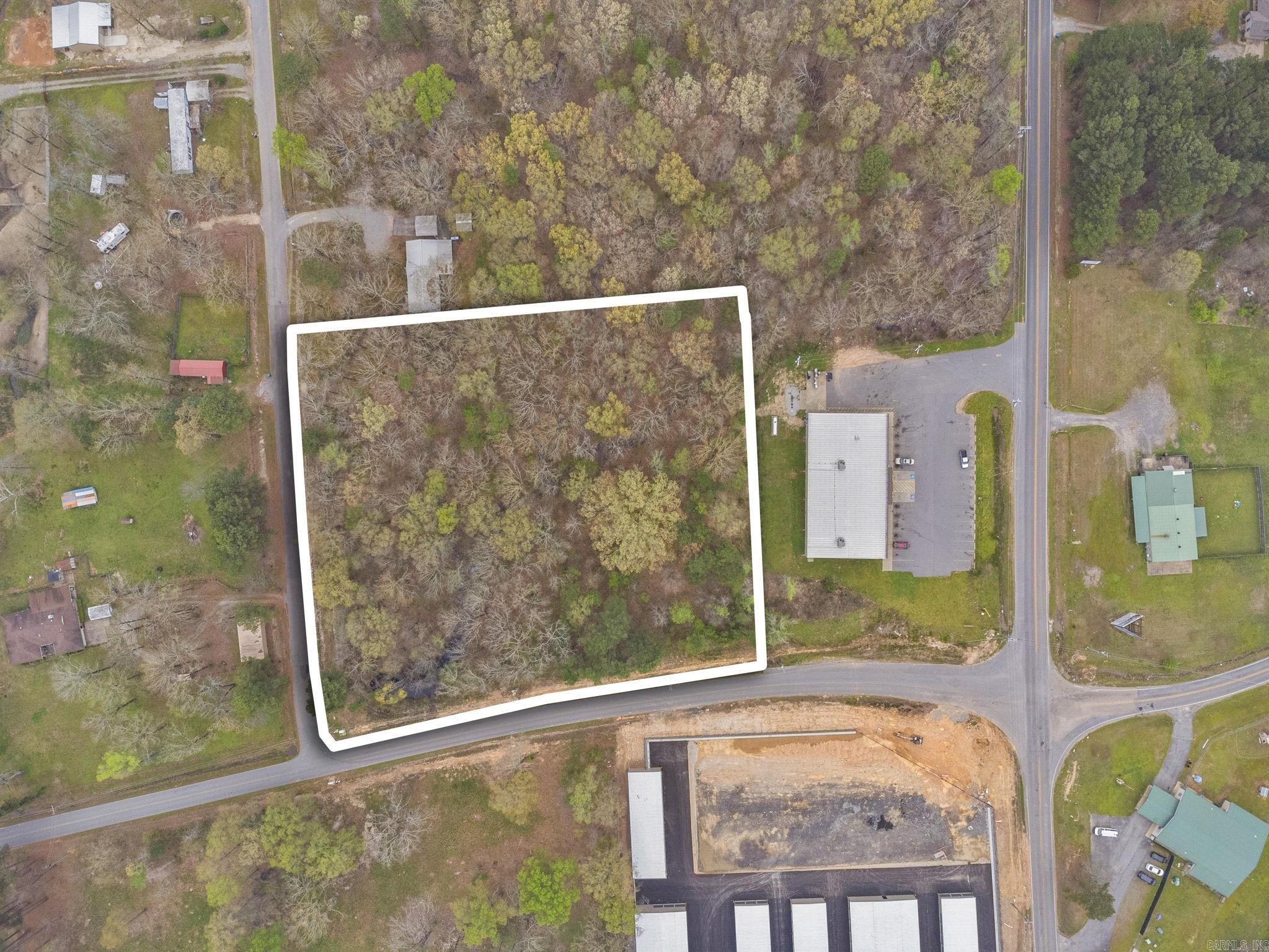 Flat land at intersection of Lawson and Congo-Ferndale road! Platted for commercial and sitting right next door to Dollar General, this property would be perfect for Storage Units, Gas Station, or possibly multi family housing. All utilities available at street. Take advantage of a great opportunity in this growing area!