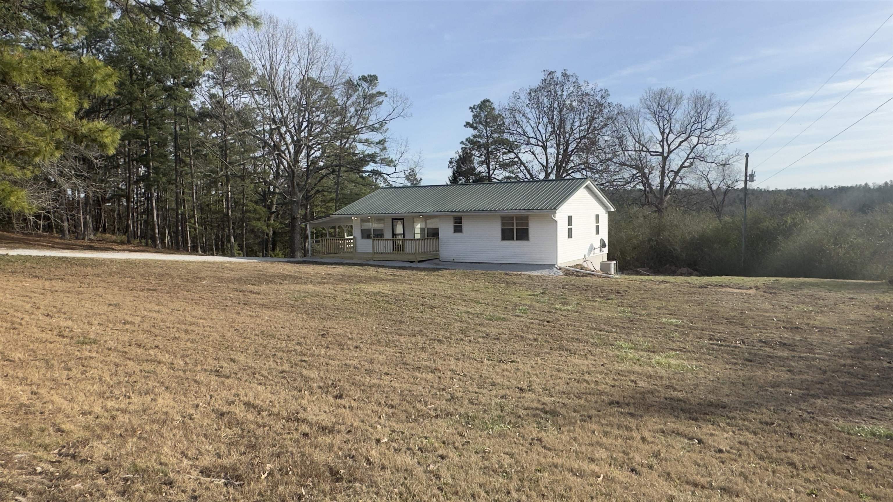 This fully remodeled 3-bedroom, 1-bath home is located in a rural area of Izard County, Arkansas, providing privacy while still being within driving distance of nearby towns and amenities. This residence offers modern updates, central heat and air, and move-in-ready convenience. Recent renovations include new flooring, fresh interior paint, updated appliances, and thoughtful upgrades throughout. In addition, there is a full basement, making it ideal for storage, a workshop, or future expansion. Enjoy relaxing outdoor spaces with both a front porch and a back deck, perfect for entertaining or enjoying the country. This home also includes a carport, a large barn, and a chicken coop, making it ideal for hobby farming or homesteading. Whether you’re searching for a primary residence, country home, or investment property in North Central Arkansas, this home checks all the boxes. Move-in ready and priced to sell at $169,900.