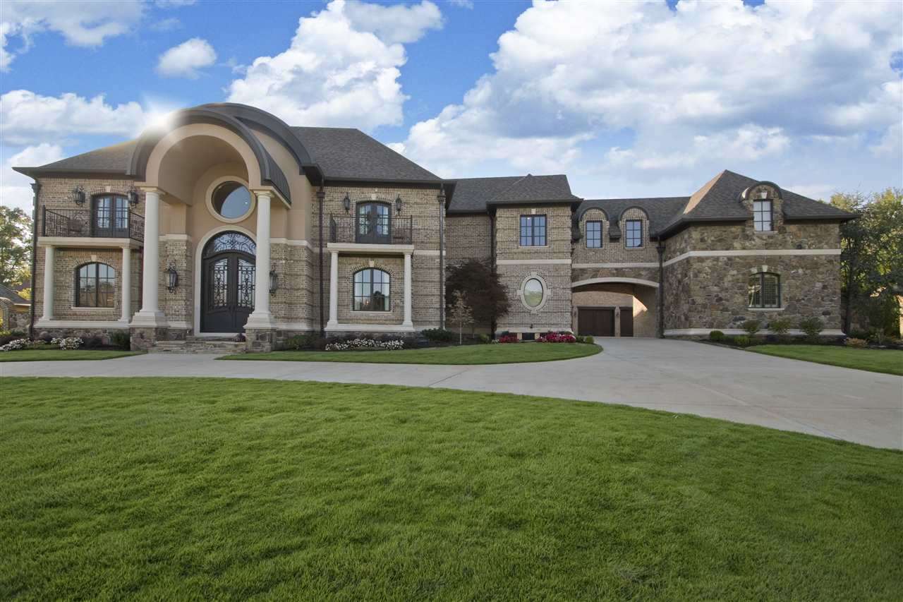 Premier custom built home in the gated Sologne neighborhood of Chenal Valley. This home has it all. Porte Cochere leads to four plus garages. Gorgeous hardwood flooring. Impressive two story entry with curved staircase.  Wine cellar. Banquet sized   dining room. Incredible chef's kitchen with two islands. Movie theater. Bonus room.  Full wet bar.  Butlers pantry. Relaxing veranda with fireplace. The geothermal units keeps costs down. Electricity $300-$60. Gas less than $100