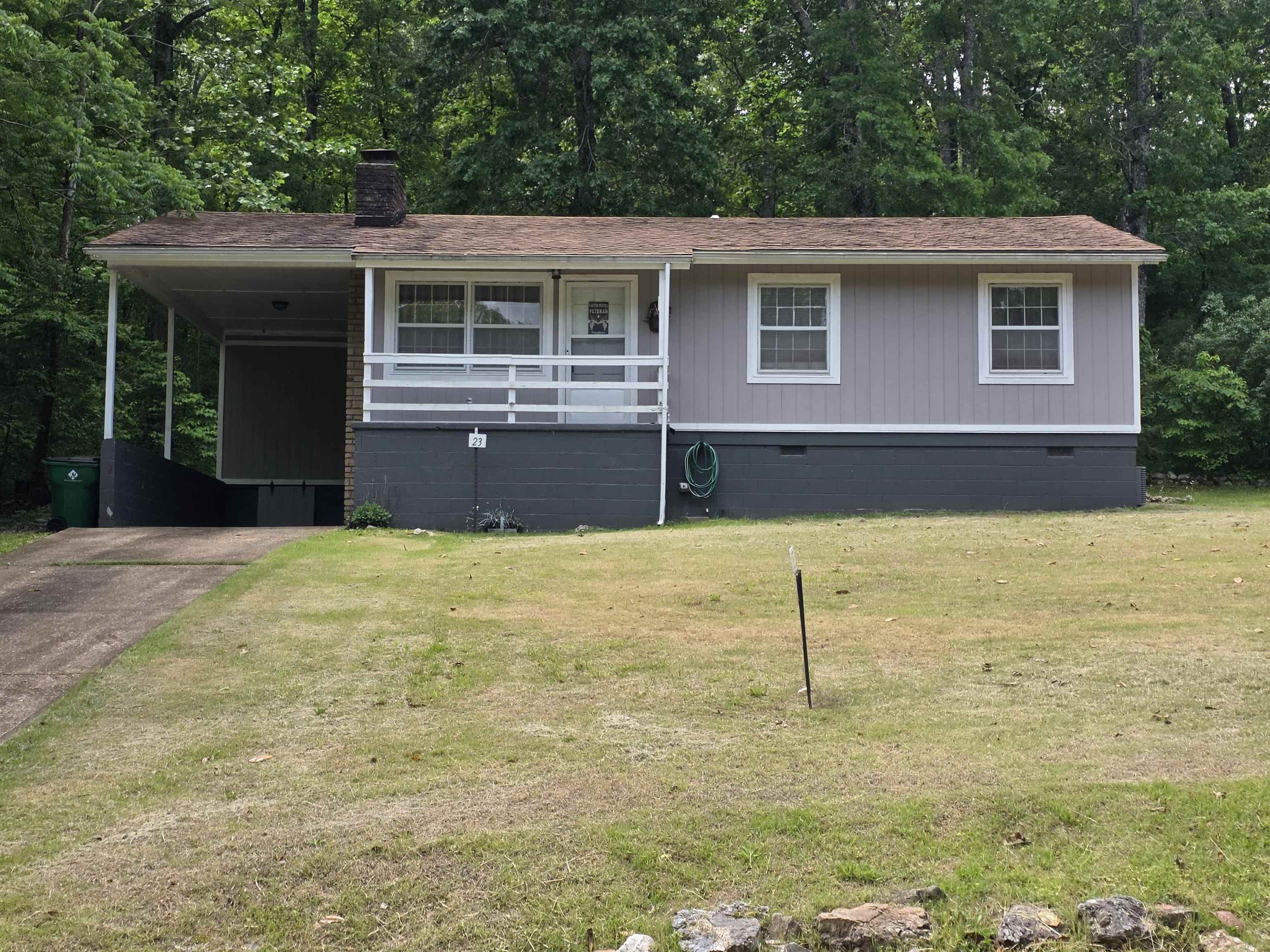 Great location for this very cozy, 2-bedroom, 1 and a 1/2 bath home. Home comes with fairly new laminate floors. All appliances stay. Some furnishings stay or can be removed. New roof, new siding, new interior paint and new flooring 2018. New AC was installed in 2019 and a new furnace in 2021. The large living room could be used as living/dining, or the large kitchen can be an eat-in kitchen. Sliding glass doors in the kitchen lead out back to a nice, covered cement patio and the carport storage, as well as the separate storage building or shop/she-shed. Architectural shingle roof. AWP installed new insulation in the attic and a vent fan in the Primary En-Suite bathroom in 2024. Updated septic tank, storm windows for energy savings and a beautiful built-in Sandstone fireplace that has been painted and piped in for gas logs. Cart distance to the North Golf course and the beautiful Southfork River. Cherokee Village property owners have access to 7 wonderful lakes, 2 beautiful 18-hole golf courses. The Thunderbird Center and of course the Southfork River. Come take a look at your new home, vacation getaway or retirement home today.