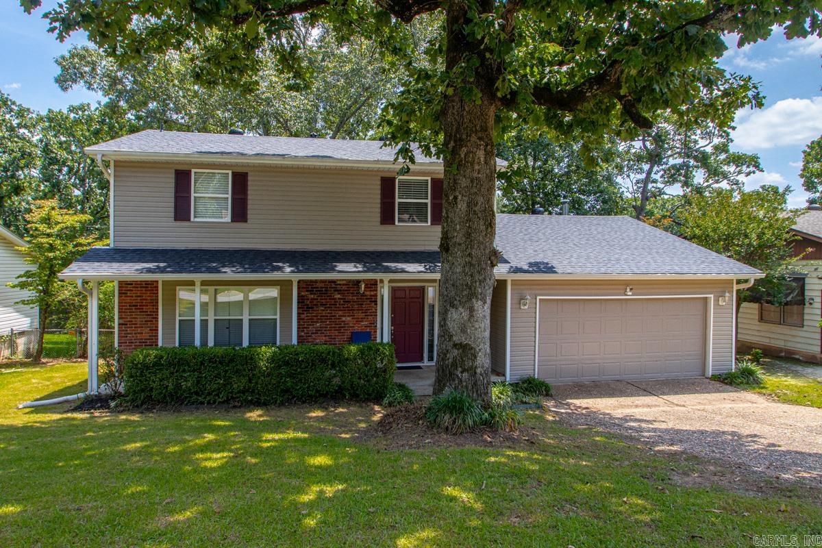 Nestled in desirable yet so convenient Indian Hills subdivision, this spacious two-story, 4BD/2 1/2BA offers versatile floor plan & numerous updates. It does have an assumable 2.875% VA loan! The main level features formal living room and a separate formal dining room which could be opened back up if desired. The formal dining room is currently being utilized as a bedroom (no closet) & could easily serve as a home office, playroom, or flex space. Formal living room provides plenty of room for entertaining, while the inviting huge den features a corner fireplace & a huge walk-in storage closet. Kitchen showcases genuine butcher block countertops, stainless steel appliances, including a built-in microwave, and attractive elongated tile flooring that extends in foyer & dining. Outside, you'll enjoy a large backyard & an expansive deck that’s perfect for gatherings, grilling, and outdoor entertaining. The exterior combines brick and siding for timeless curb appeal. Additional features include a security system, two heat and air units, hot water heater less than five years old, and architectural roof replaced in March 2026. Don’t miss this opportunity to see this family-friendly home!
