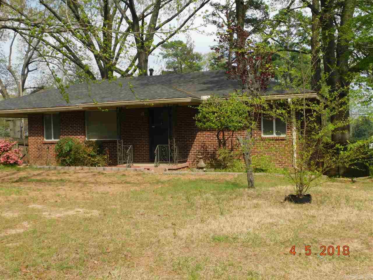 This home has been well maintained inside & out. 3 bedrooms, 1 bath with a fully furnished eat-in kitchen including walk-in pantry. Large living/dining room combo with very nice hardwood floors, window coverings, HVAC & plenty of storage Covered parking, fenced back yard, nicely landscaped, mature trees & large deck. Call Marshall Peters & Associates 501-414-8340