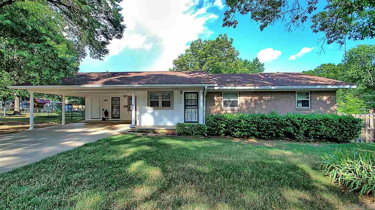 1st time Buyers! Recent Improvements include: ROOF(5-8) VINYL WINDOWS, H&A, Carpet, Flooring, Light fixtures & MORE! This home is located on a DOUBLE CORNER LOT(.43 acres) w/an extra wide, side gate for all your toys + TWO storage sheds out back for EVEN MORE storage. Partially covered, over-sized deck+workshop attached to house. Double Carport with room on the side to store even more vehicles. This home offers much in the way of closet & shed storage. ALL this this house needs is YOU. Agents see comments.