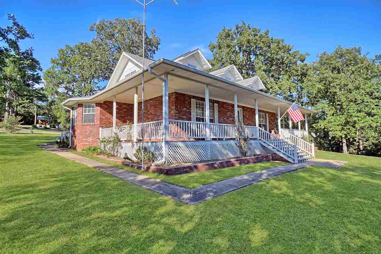 If you have been looking for a nice home on a little land out in the country this may be it. Inside you will find an open floor plan with a huge kitchen with more cabinets than you can imagine. The master is down stairs and so is a large living room makes great use of the 2200 sq feet. .There is also a dining room and an office. Out side you have room to roam with almost eight acres. There's also a garden spot., wood furnace and a storm cellar. This is the first time this home has been offered to the public