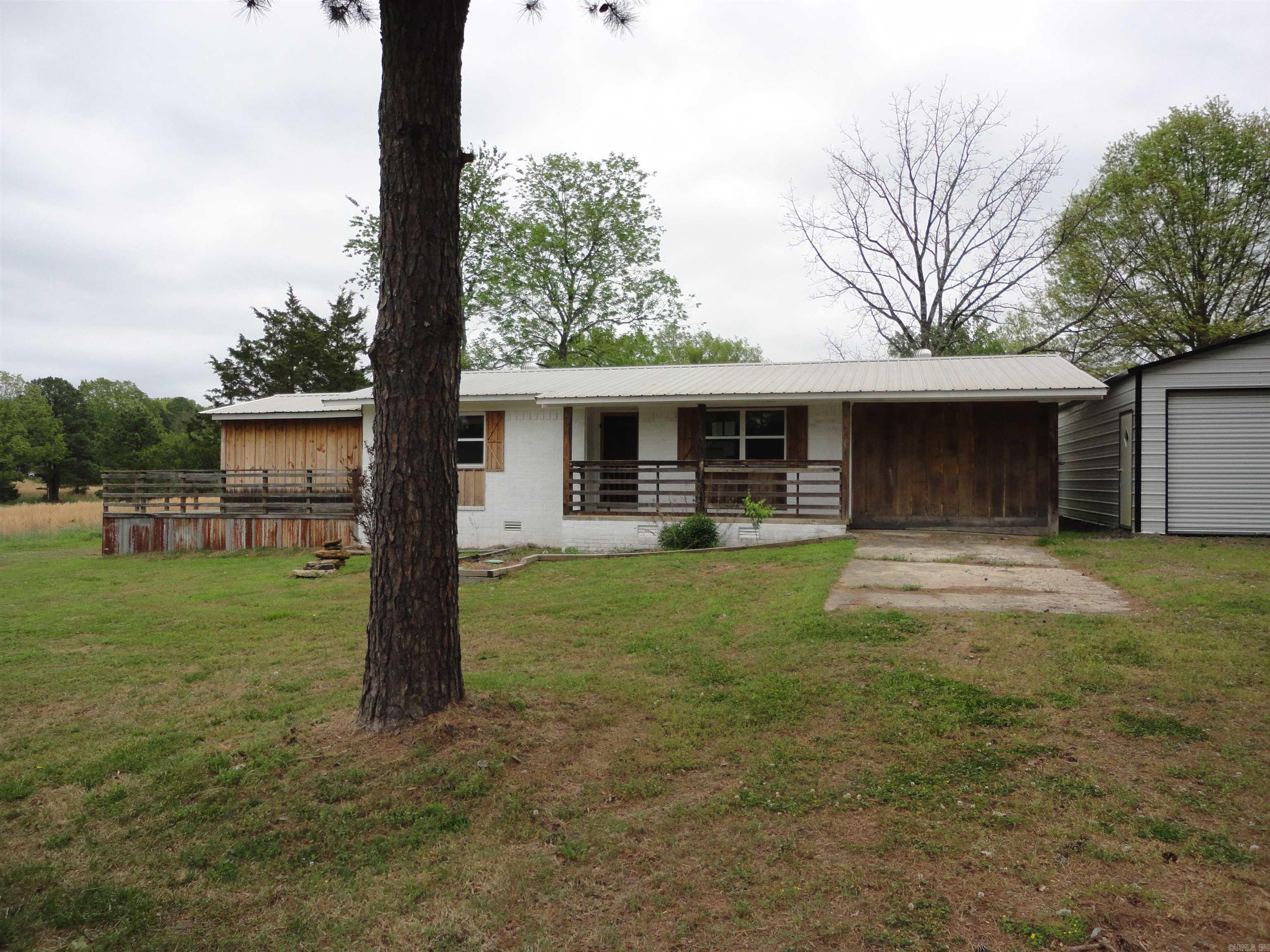 Don't miss out on this great 2 bedroom 2 bath home with open kitchen living room layout with fireplace.  Large yard with detached 2 car garage. AGENTS please READ confidential remarks for showing instructions and offer submission information.