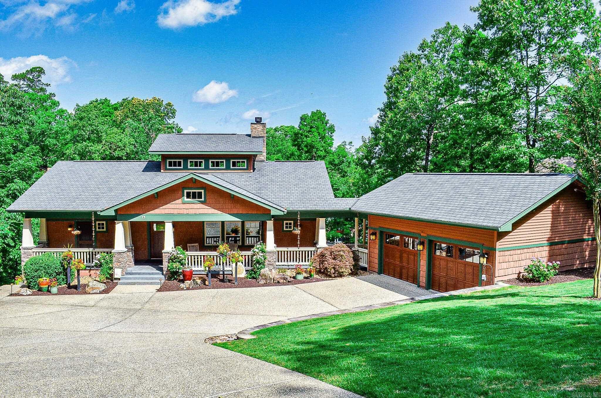 AGENTS SEE REMARKS! Authentic Craftsman home, with the style of a 110 year old home but with all of today's technology! Including 3/4" solid oak flooring (never refinished) w/mix of flat, rift & quartersawn cuts at various widths, custom leaded glass in front door, cabinet doors & above pantry, seeded glass in some kitchen cabinetry (period-specific), soapstone counters in kitchen, mudroom & powder room, travertine limestone in primary bath, central vac w/Hide-a-Hose system that reaches every room, all trim & stained cabinetry on main level is quartersawn oak, power window in cupola for venting, push out casement windows w/retractable screens for visibility & cleanliness, framing & slab cutout for future elevator, plumbed-in coffee maker, large boat dock, extensive landscape w/waterfall, ROOF 01/29/25 & much, much more (list available in documents and see additional video for demonstrations).