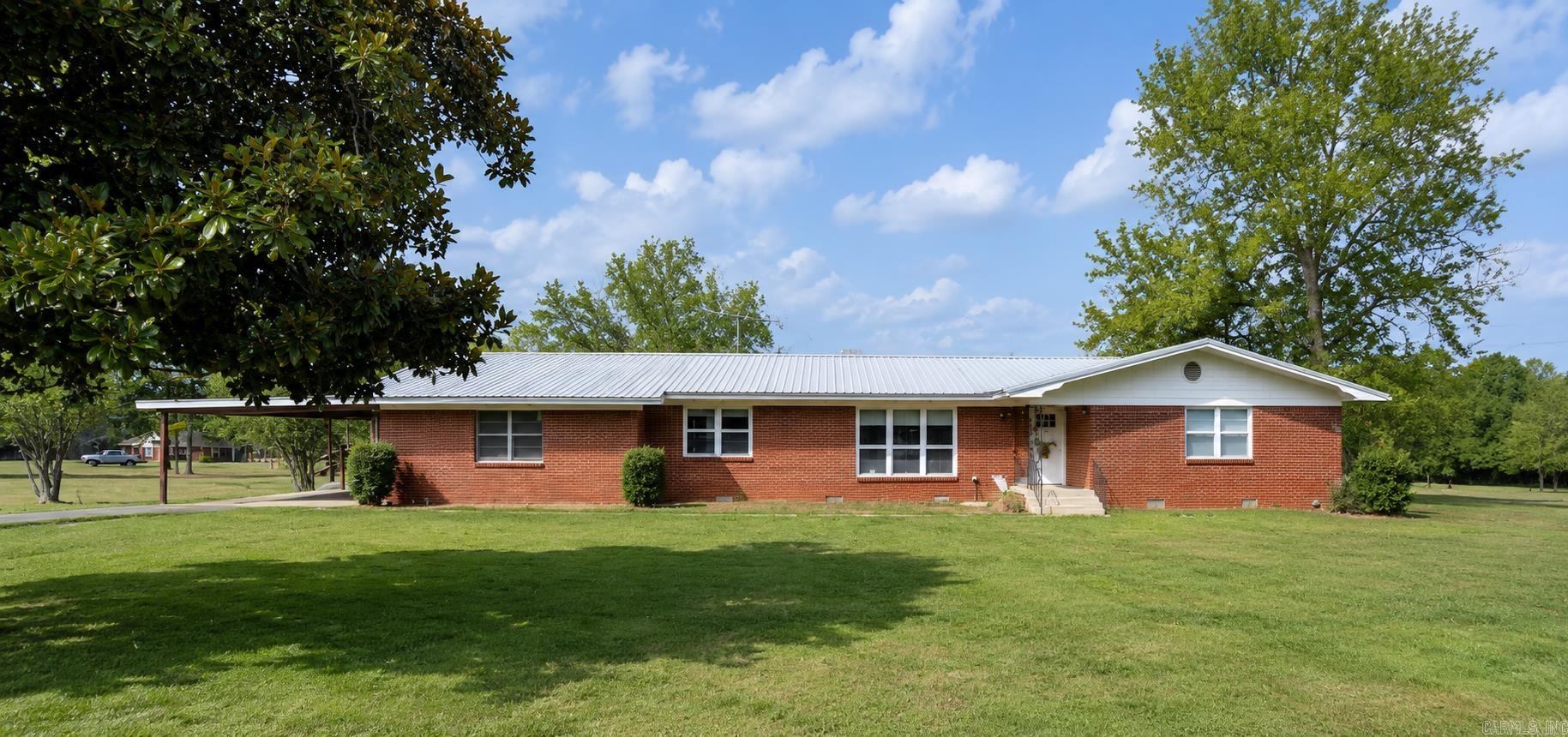 Well-maintained 3 bedroom, 2 bath home offering 2,364 sq ft on 4.82 acres along Hwy 25 on the east side of Quitman. This versatile property offers excellent highway frontage and plenty of room for a small farm and/or potential use for a commercial business. The move-in ready home has been well cared for and features numerous updates including vinyl windows, LED can lighting, updated toilets, and added 12" insulation for efficiency, as well as a metal roof. Major improvements include new interior paint, LVP flooring and a new HVAC system installed in 2024. Inside you’ll find an additional living/den area and a flexible bonus room that could serve as an office or 4th bedroom. With fiber optic internet available and room to grow, this property offers the perfect blend of comfort, convenience, and opportunity just minutes from Quitman and within 15 minutes of Cove Creek Rec Area on Greers Ferry Lake.