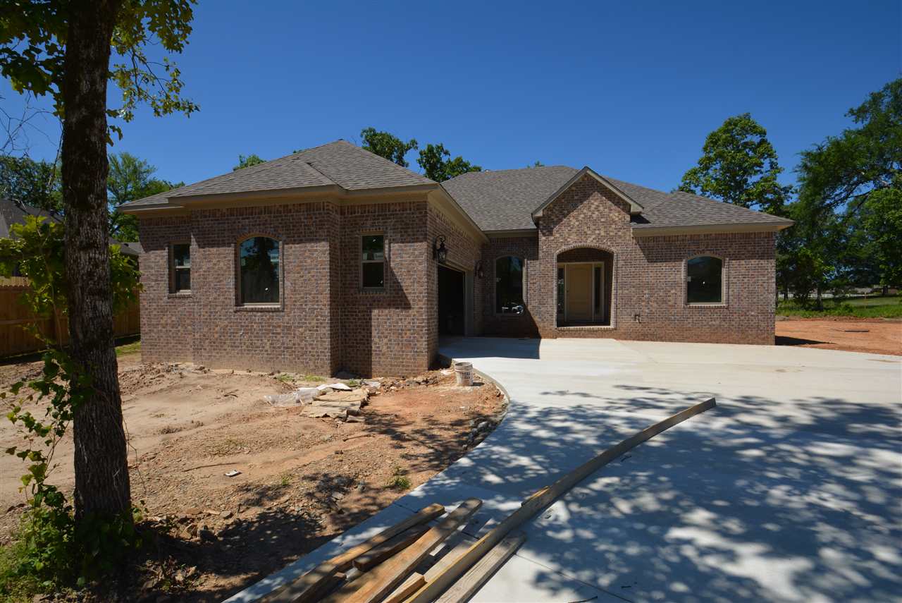 Beautiful New Construction in the Lake Hamilton Area by CLE Homes!! This Open Concept Floor Plan features Hardwood Floors, a Beautiful Trim Package, Wood-Burning Fireplace in the Great Room, Custom Cabinets & Granite Counters throughout the Home, Eat-In Kitchen + Separate Dining Area, Generous Master Suite w/ Jetted-Tub & Separate Shower, Split Floor Plan, and a ton of other features found in a Custom Home!! .40 Acre Lot.  Great Location!  Call Today for a Tour!