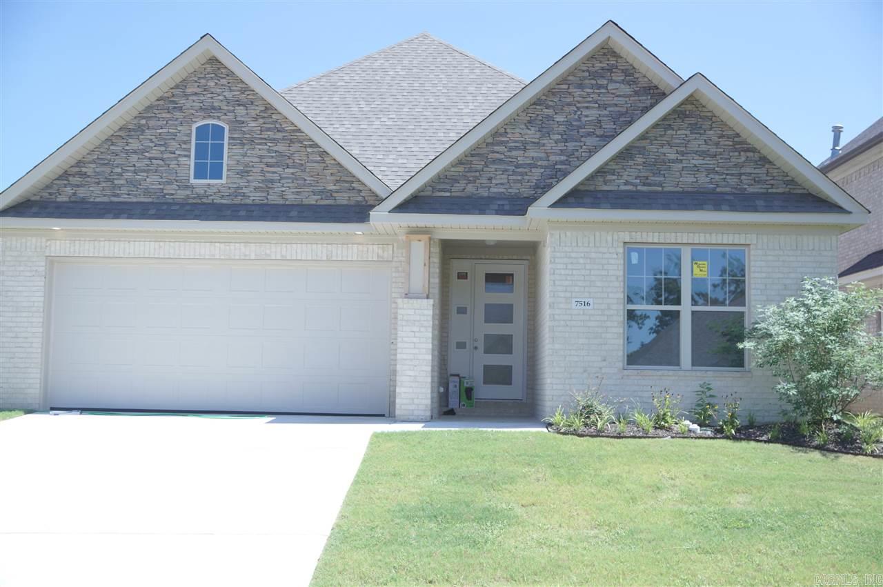 Georgeous home.  Beachy colors and style.  Cabinets to the ceiling, wood tile.  Energy saver.  Small Yard.  Enjoy the lake lifestyle.  375 Acre lake.  Fish, boat, kayak.  Swimming pool, clubhouse, tennis, playground.  Best lake community in central Arkansas.  Large walk in tiled shower.  Granite upgrades.