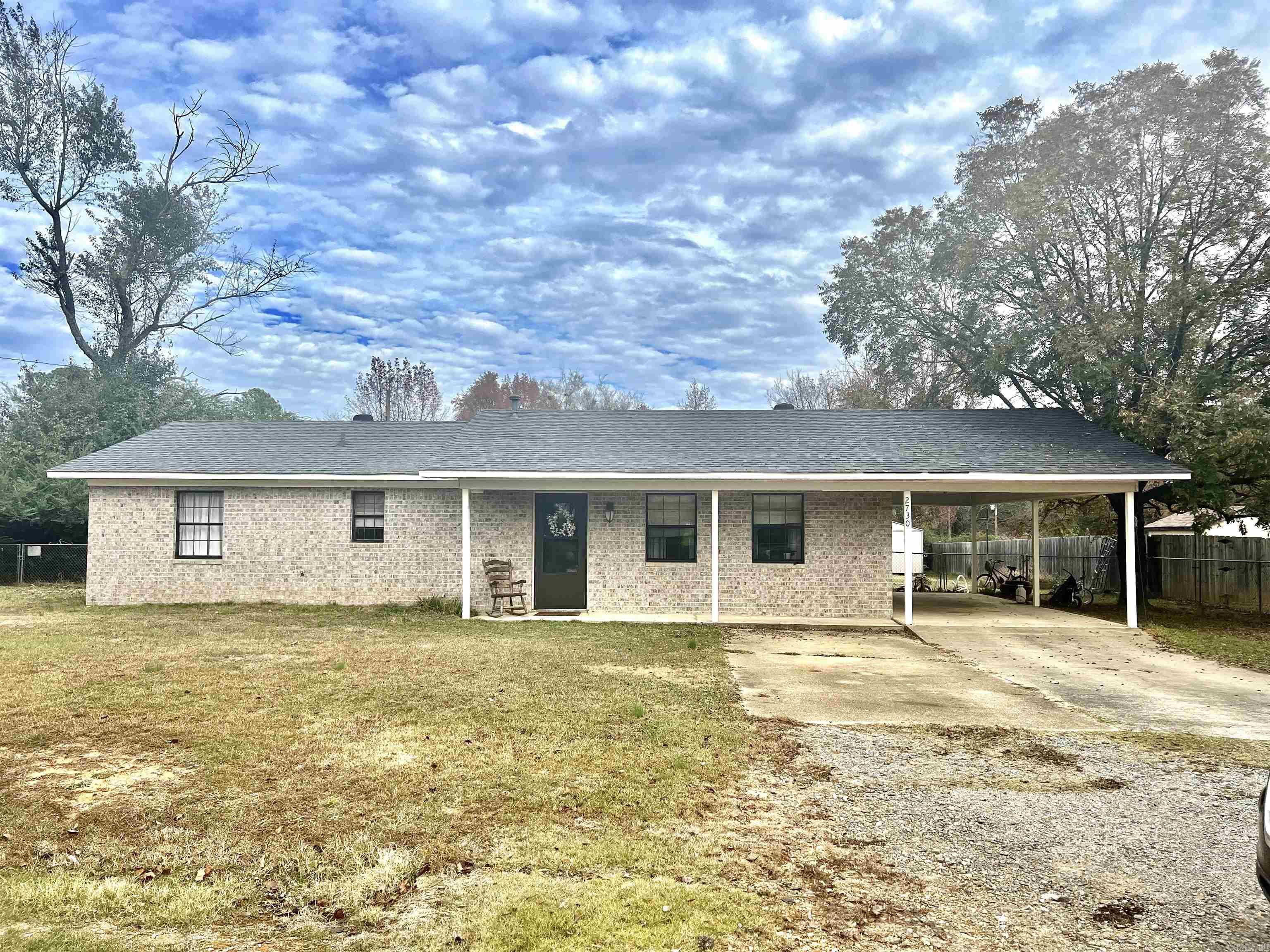 This property offers a comfortable and inviting living space for those seeking a cozy and well-maintained home. As you step inside, you'll immediately notice the open floor plan, which creates a seamless flow throughout the house. The new floors add a touch of modern to the space, while the fresh paint throughout gives it a bright and clean atmosphere. New roof in 2017. New hot water heater in 2016. The half-acre fully fenced lot provides ample space for outdoor activities and entertainment. For those who enjoy tinkering or need extra storage space, there is a small shop in the backyard equipped with electricity. This can be used as a workshop, hobby room, or simply as additional storage for your belongings. Convenient access to local amenities and attractions as well.  Agents please see remarks.