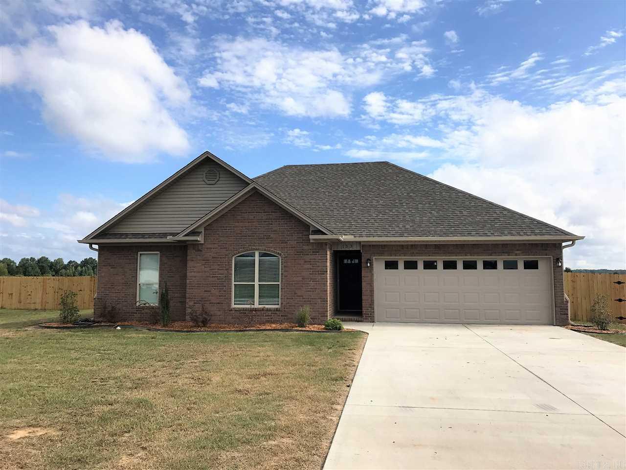 Brand new house at the edge of city limits! This great 3 bed/2 bath features an open floor plan with huge kitchen, walk-in closets, and all the amenities.  Beautiful granite and split face backsplash.  Stainless steel appliances.  Spacious and perfect for a first time home buyer.  Take advantage of the energy efficient features of a brand new home! New privacy fence and custom tile shower added! Additional adjoining lot is negotiable.
