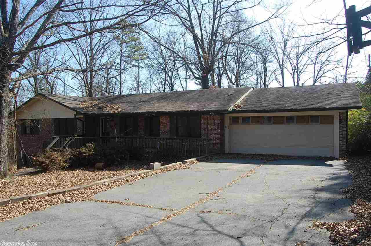 Large older brick home built in early 70's. 3 Bedroom, 3 Bath with walkout basement. Square footage includes basement. Also included is 24 X 36 Brick shop. For the price, this is a Handy man or flippers dream.