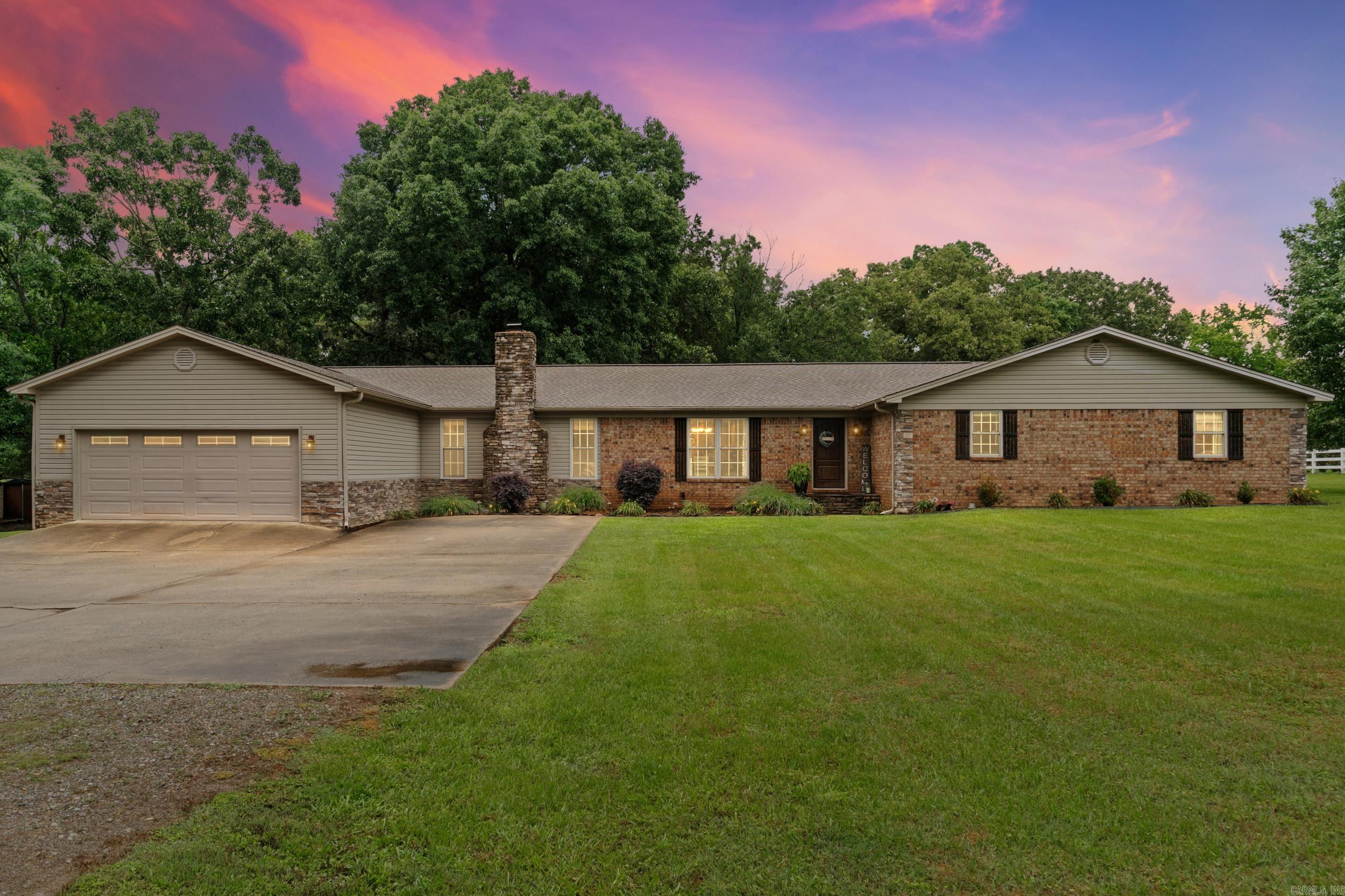 Just minutes from Searcy! This spacious & versatile 5-bedroom, 3.5-bath home offers room to spread out both inside and out! Situated on 2.56 acres with a partially fenced backyard, this property is perfect for those seeking space, comfort, and functionality. Inside, you’ll find two master suites, ideal for multi-generational living or added guest privacy. Multiple living areas including a large living room with a cozy fireplace and separate den provide endless possibilities for entertaining, relaxing, or working from home. Additional features include a storm shelter for peace of mind. Brand new refrigerator conveys with the sale. New roof in 2025. Master Bed Side HVAC New in 2025. Acreage, flexible living space, and desirable amenities, just outside city limits combines comfort and country living in one exceptional package! See Agent Remarks