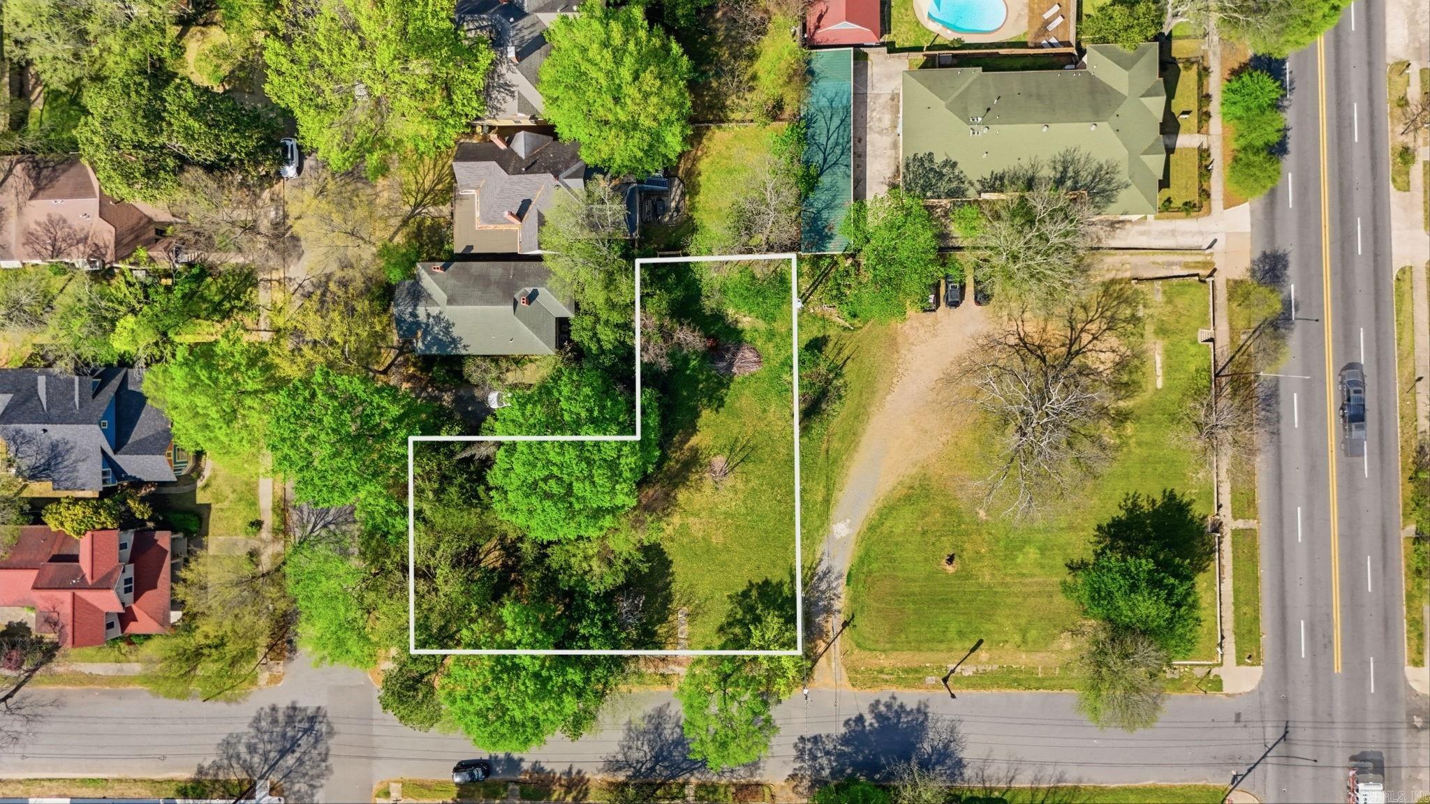 .42 acres in the heart of downtown Little Rock - 2.5 lots being sold together as one parcel, located on the Arch St side of 15th. The Broadway-facing lots can also be purchased separately. Great location with easy access to SOMA, Pettaway, the River Market, and the interstates, making it easy to get anywhere you need to go.