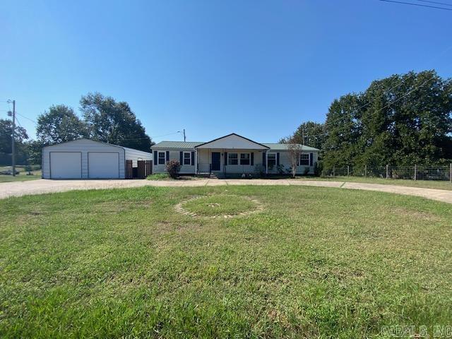 Large spacious 4 bedroom 3 bathroom home with formal dining, 2 living areas with decorative fireplace and huge 24x45 shop with basement under home. 2 primary bedrooms with full baths. Plenty of room to entertain guest with huge living room with large deck off double doors. See Agent remarks before showing.