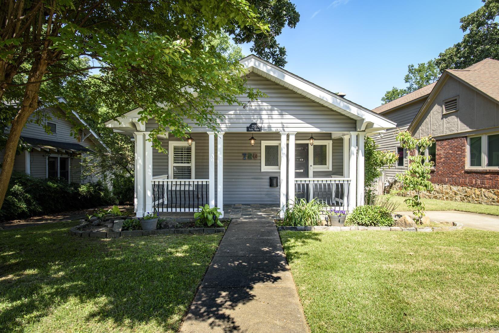 Completely remodeled Craftsman Bungalow in the ideal Hillcrest location! Chef's kitchen with custom cabinetry, soft closing drawers, double ovens, a 6-burner gas range, and an undermount, farmhouse sink. Original hardwoods & new tile floors throughout. The primary bedroom features an ensuite bathroom with a tub fit for two, a walk-in shower, a double vanity, an enclosed commode with a seat warmer, and a bidet. Outdoor living space fantastic for entertaining! Covered kitchen equipped with a built-in grill and a pizza oven! A detached shed with 110V will delight every gardener! Tankless water heater, recently replaced roof, windows, and HVAC. Some photos are historical. Truly a must-see, one-of-a-kind gem!