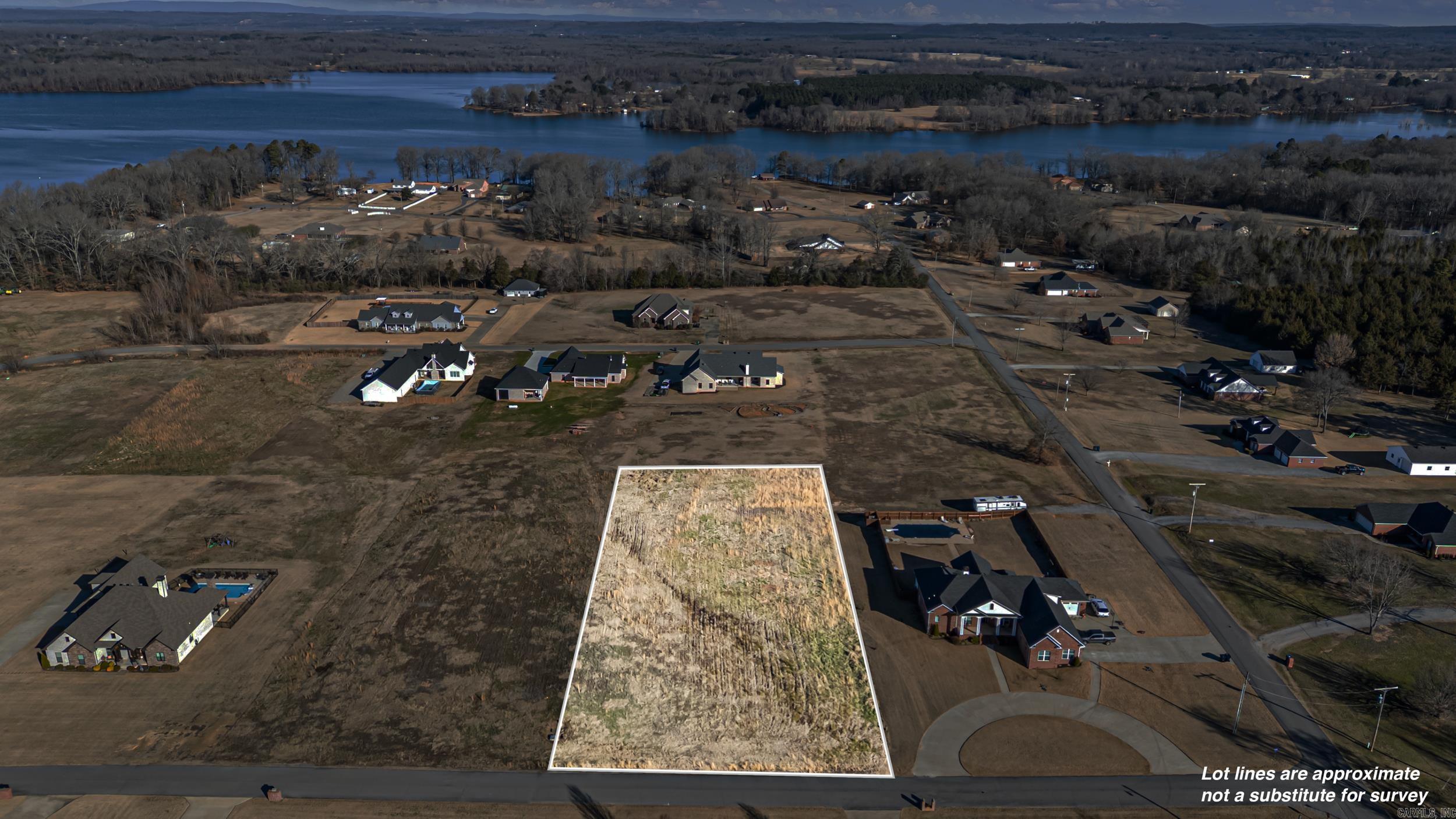 Build your dream home on this 1.2± acre lot located in the highly sought-after Woodlands Subdivision, just outside of Morrilton, Arkansas. This beautiful property offers the perfect blend of privacy and convenience, with a peaceful, wooded setting while remaining just minutes from town amenities, schools, and shopping. Enjoy the space and flexibility that larger acreage provides, all within an established neighborhood known for its attractive homes and quiet surroundings. Utilities available at the road (buyer to verify). Don’t miss this rare opportunity to own a premium lot in one of the area’s most desirable subdivisions!